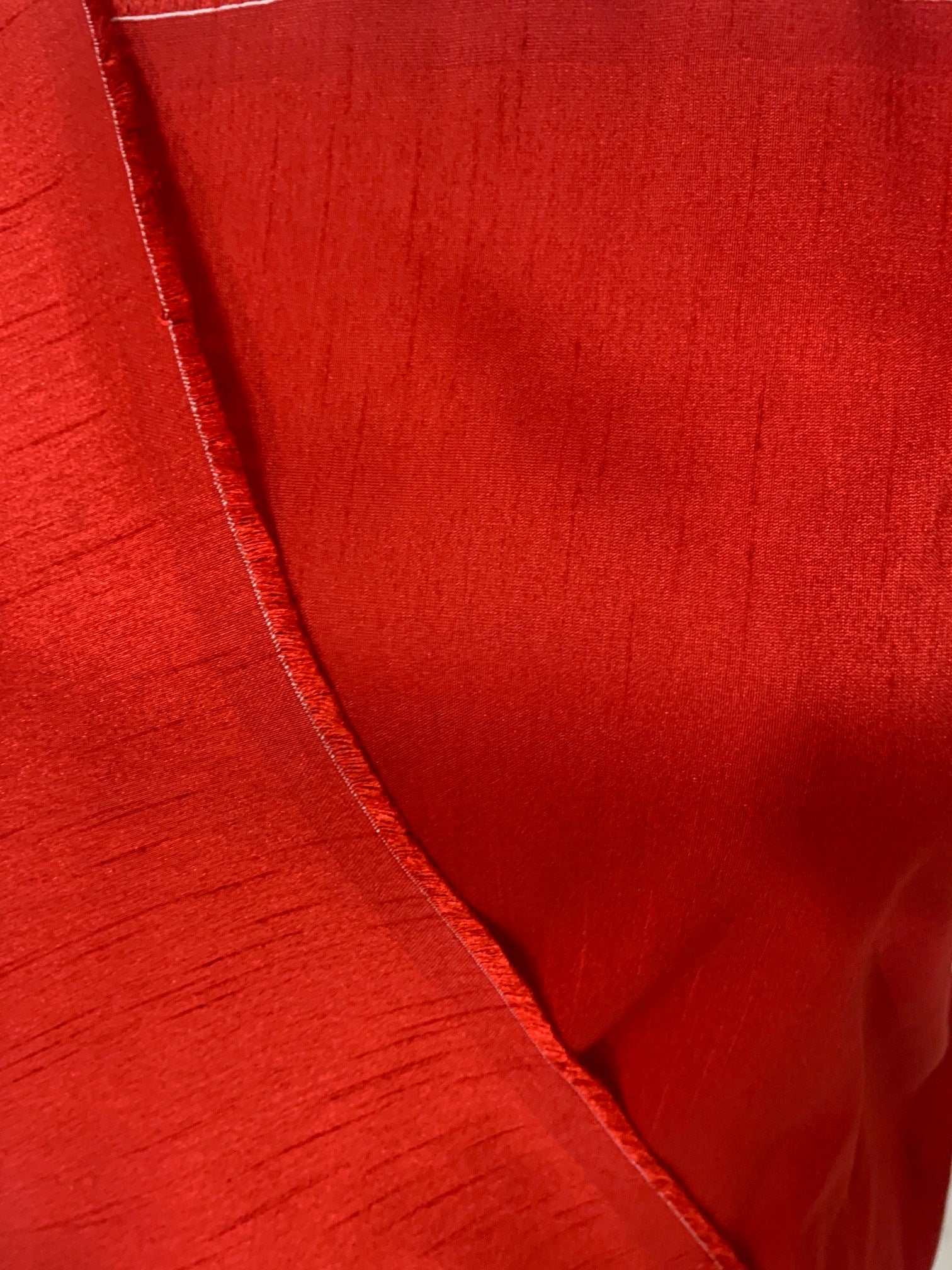 Red satin shantung fabric width 58" polyester, slubbed texture dull fininshed, dress, suiting and home decoration item. item 114