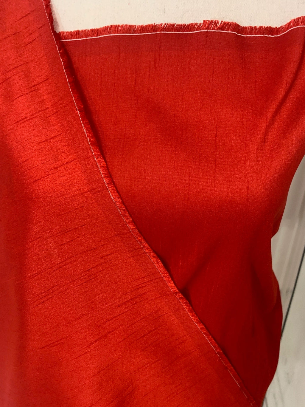 Red satin shantung fabric width 58" polyester, slubbed texture dull fininshed, dress, suiting and home decoration item. item 114