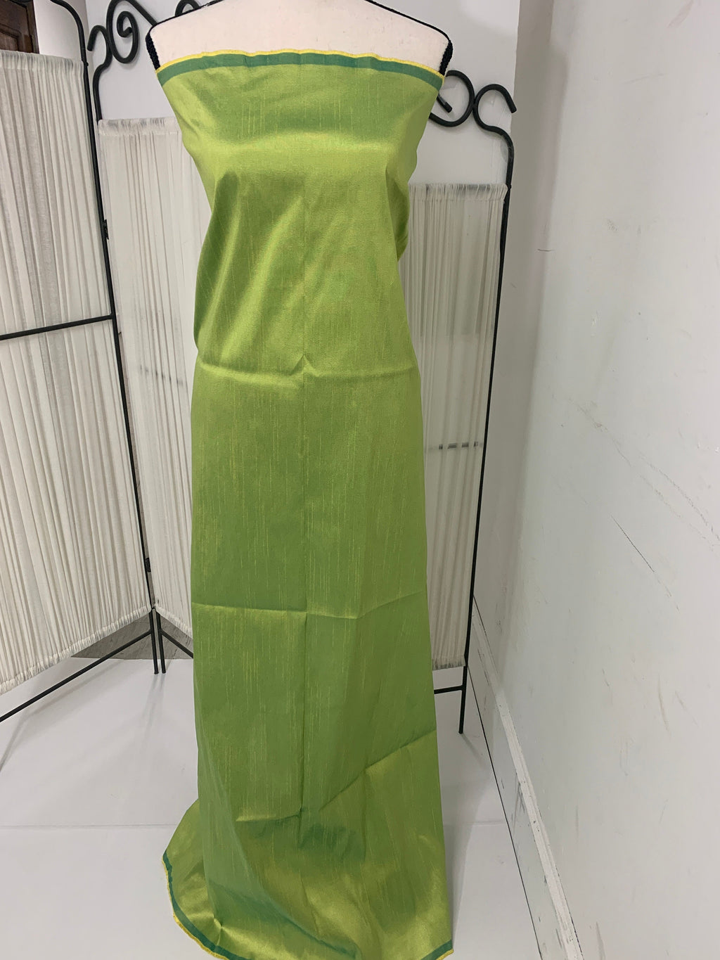 Olive poly dupioni fabric width 58". fabric has fuchsia tone, made of two different color of olive and turquoise blue. free smple.