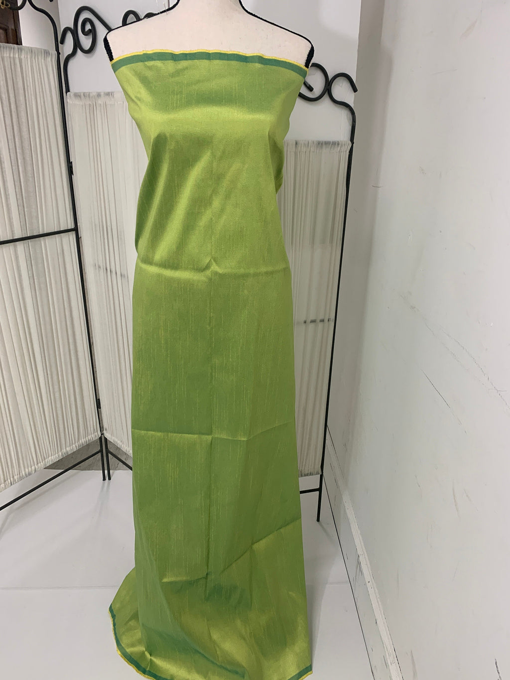 Olive poly dupioni fabric width 58". fabric has fuchsia tone, made of two different color of olive and turquoise blue. free smple.