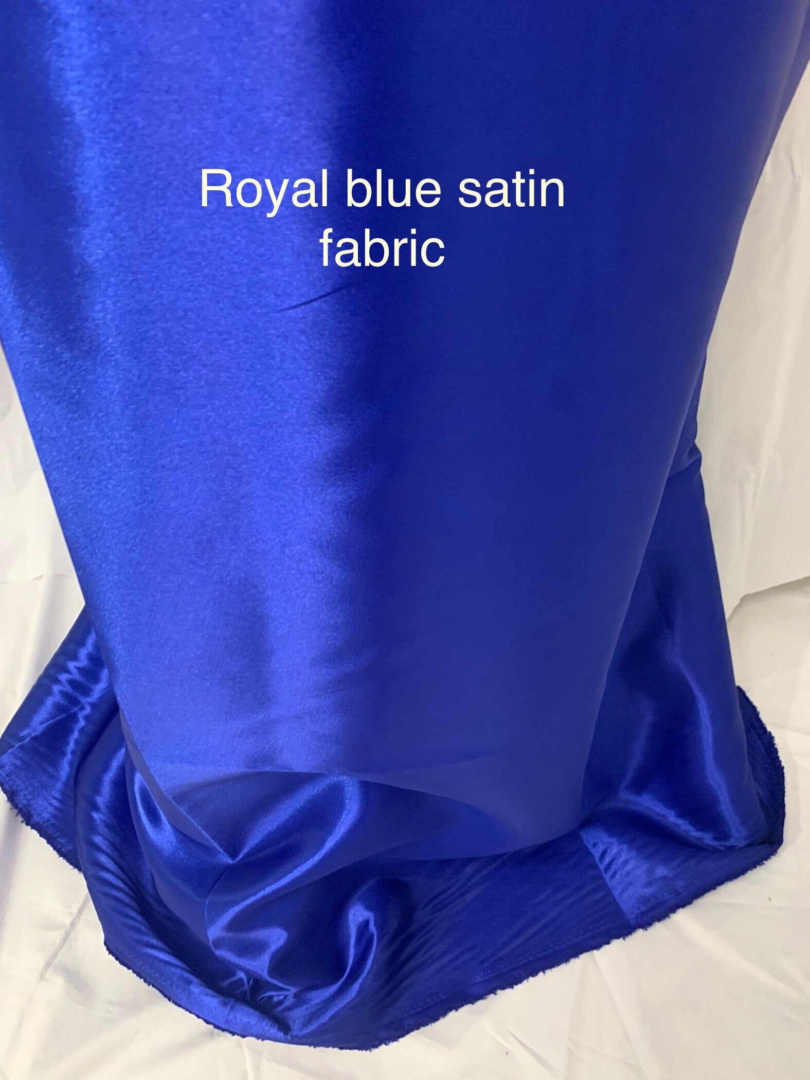 Royal blue satin width 58" polyester. great fabric for bridesmaid, table cover decoration and craft. free sample.
