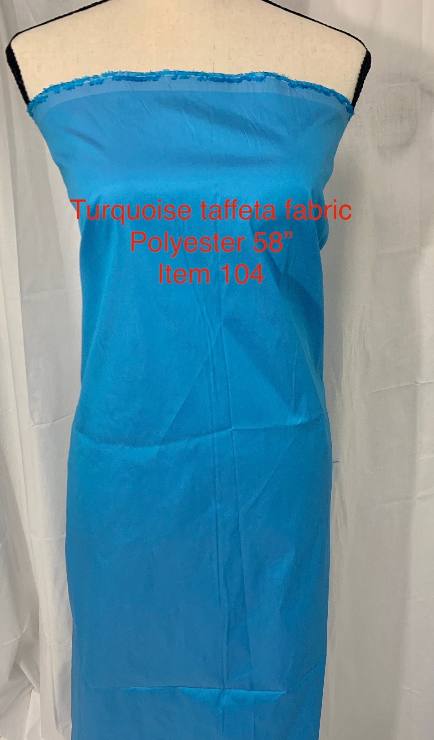 A 2 yards cut Taffeta fabric color turquoise. width 58" polyester. sell by 2 yards increment continuous.
