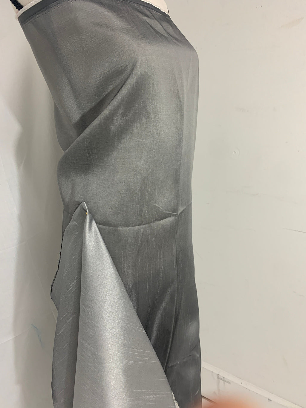 silver grey shimmer shantung fabric, width 58". Is a double sided fabric with slub, shimmery and dull sides dry clean fabric. Free sample.