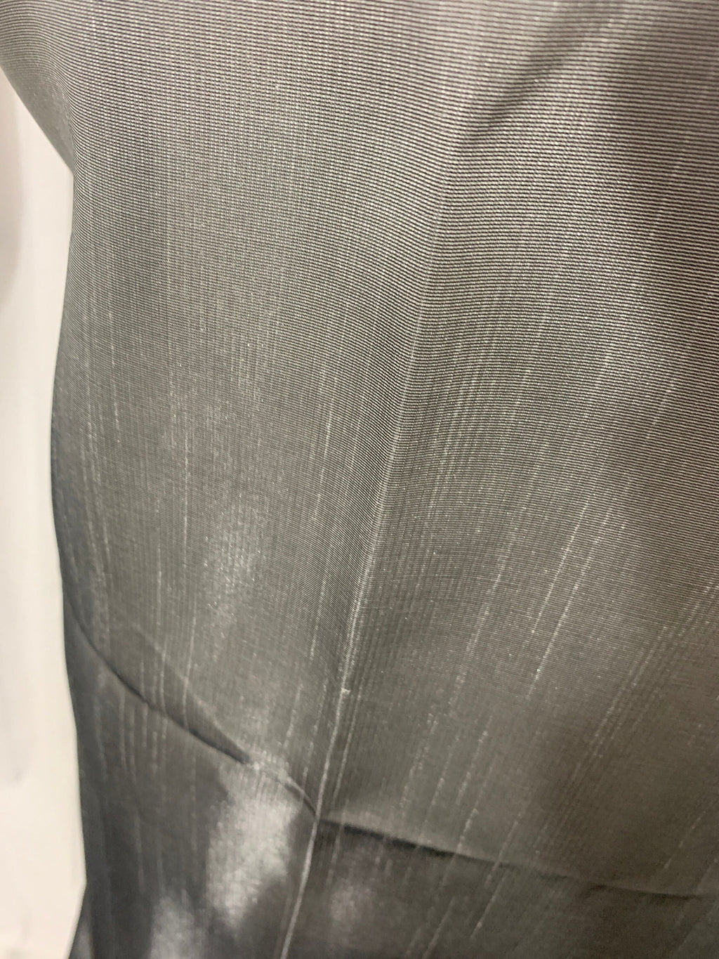 silver grey shimmer shantung fabric, width 58". Is a double sided fabric with slub, shimmery and dull sides dry clean fabric. Free sample.
