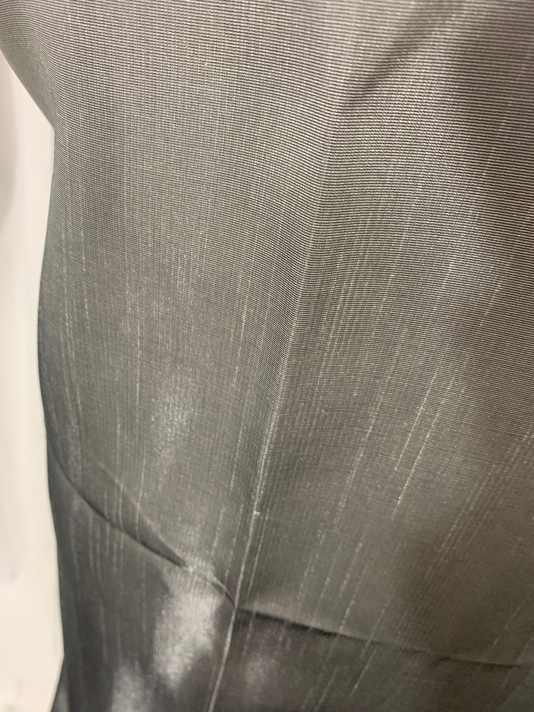 silver grey shimmer shantung fabric, width 58". Is a double sided fabric with slub, shimmery and dull sides dry clean fabric. Free sample.