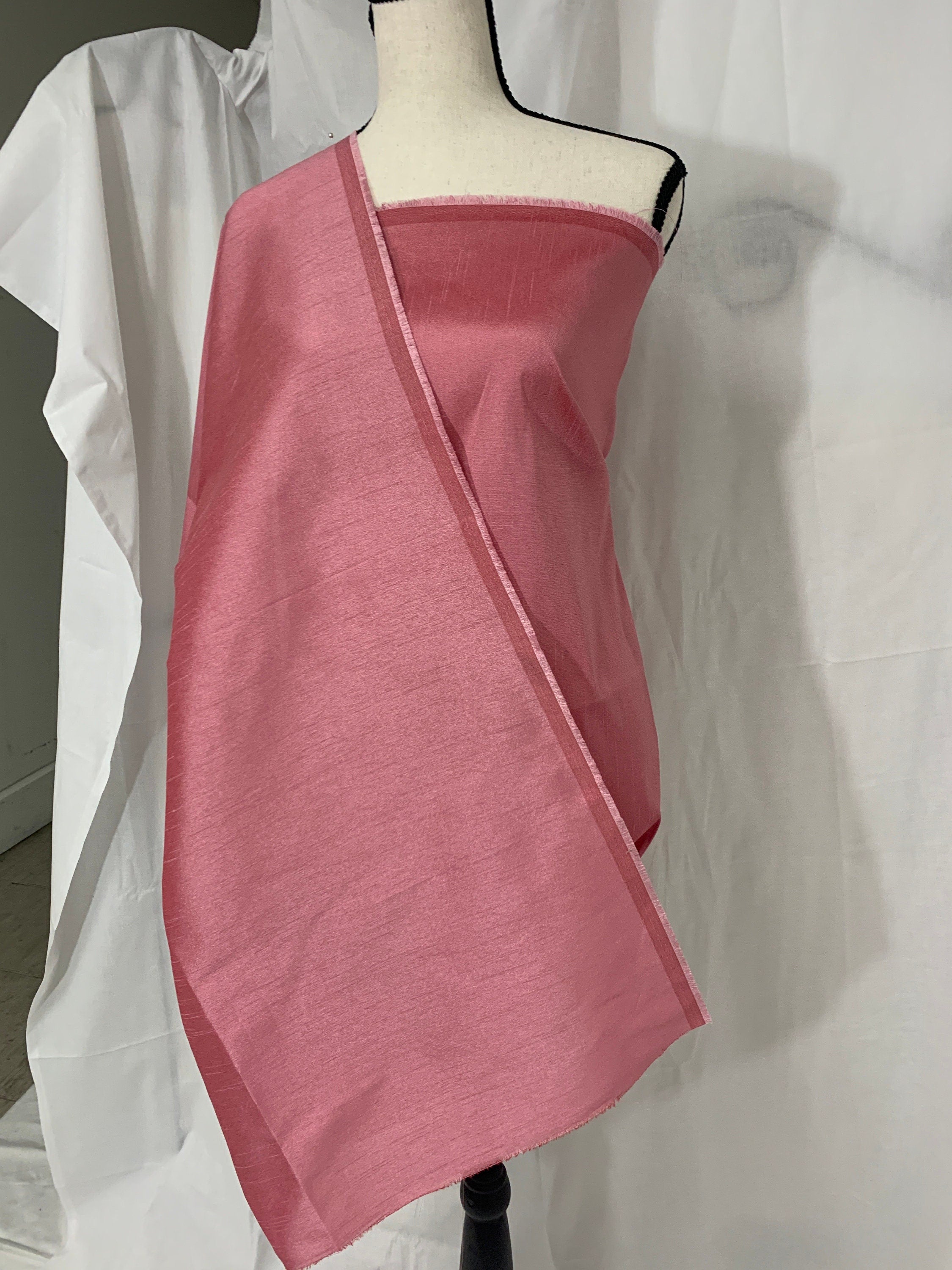Rose color poly dupioni fabric width 58". made of two different color of threads sage and yellow. free smple. item# 108