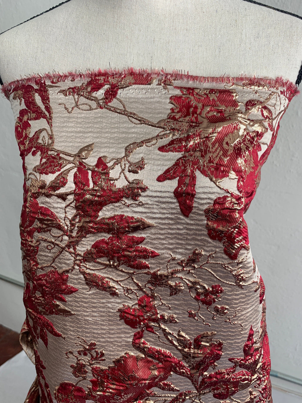 Brocade floral metallic fabric. color burgundy 56"