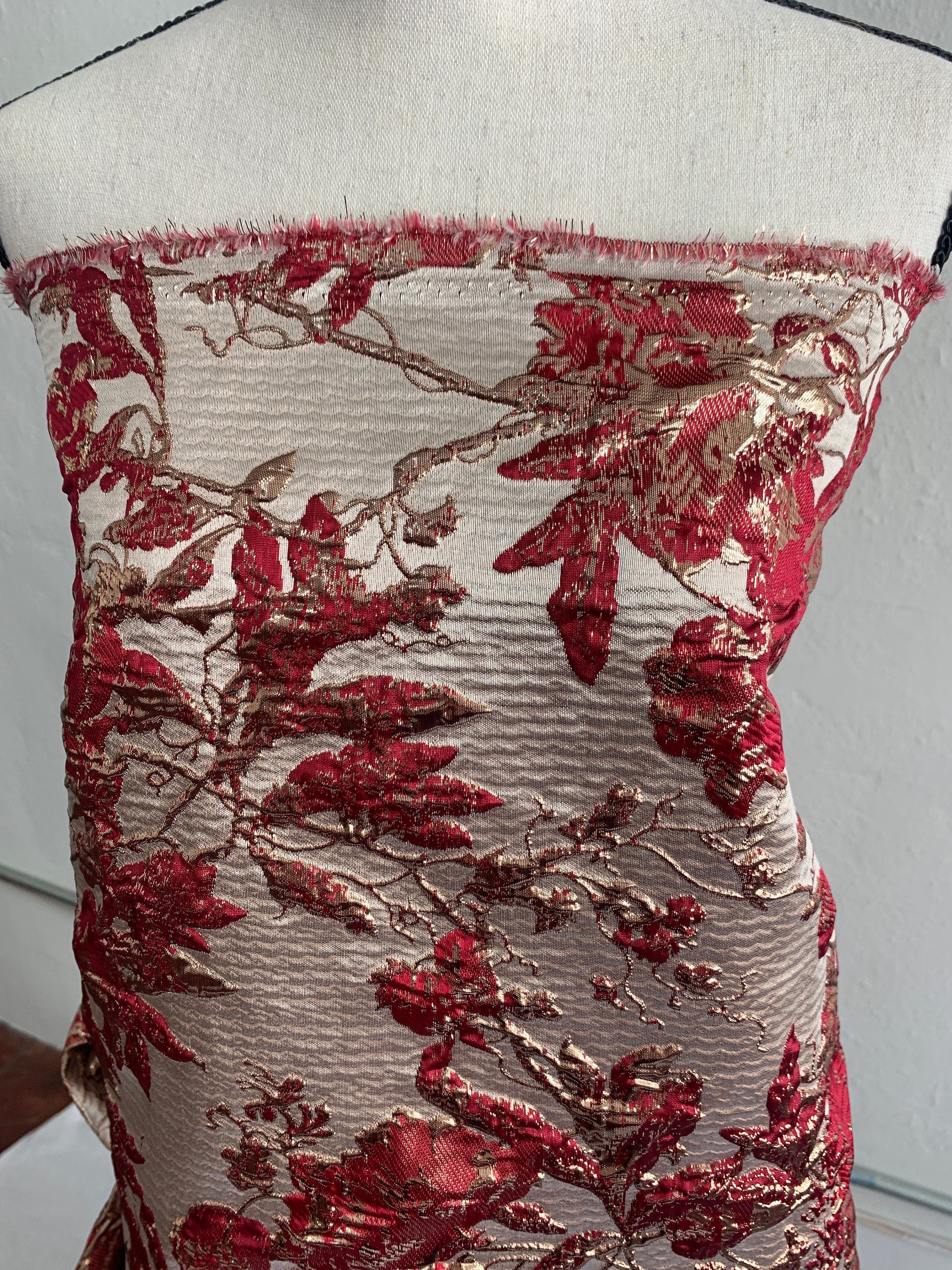 Brocade floral metallic fabric. color burgundy 56"