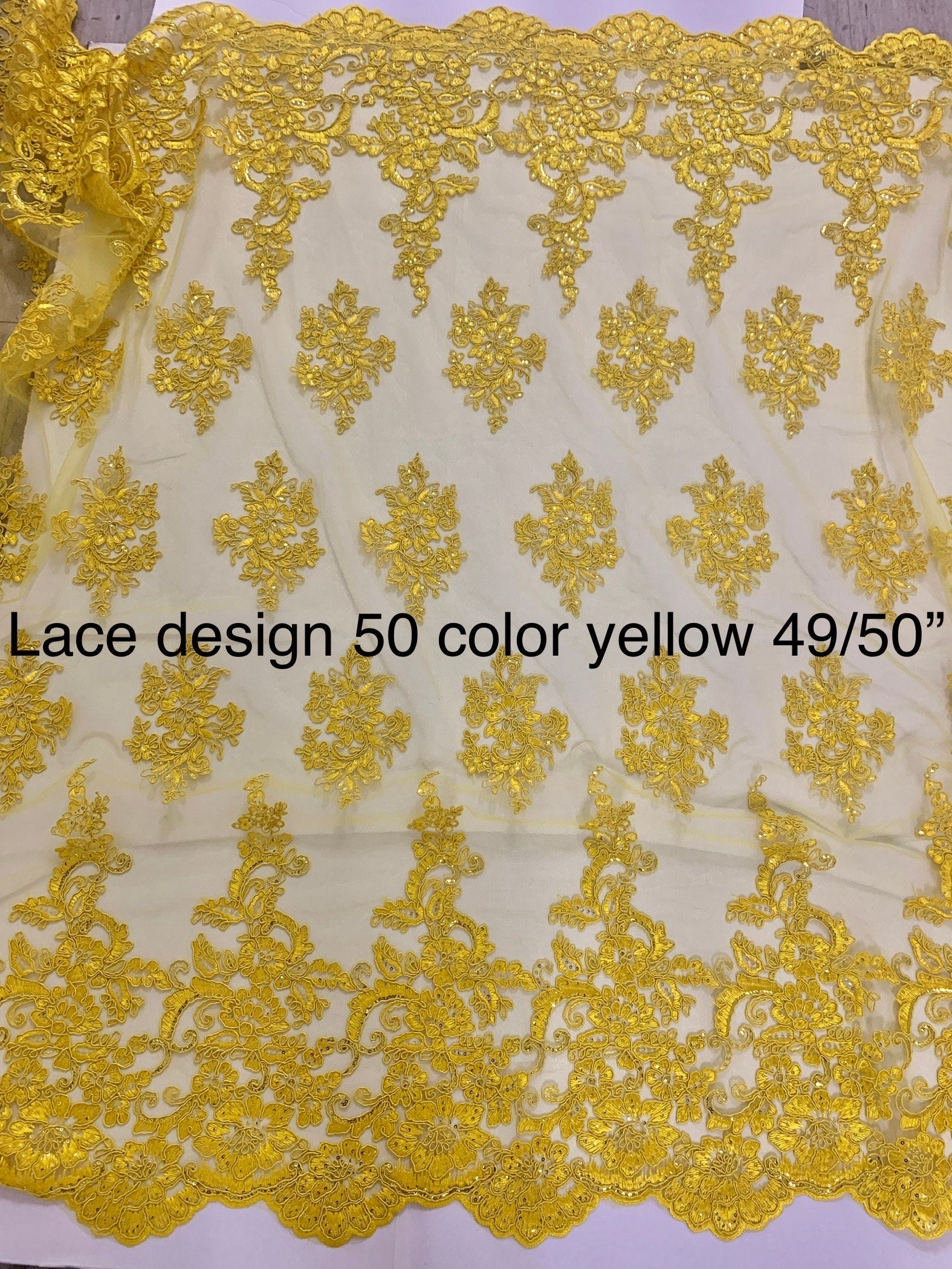 A 2 yard Yellow color Lace Design US50. Double scalloped sequence embroidered width 49/50 inches. condition New.