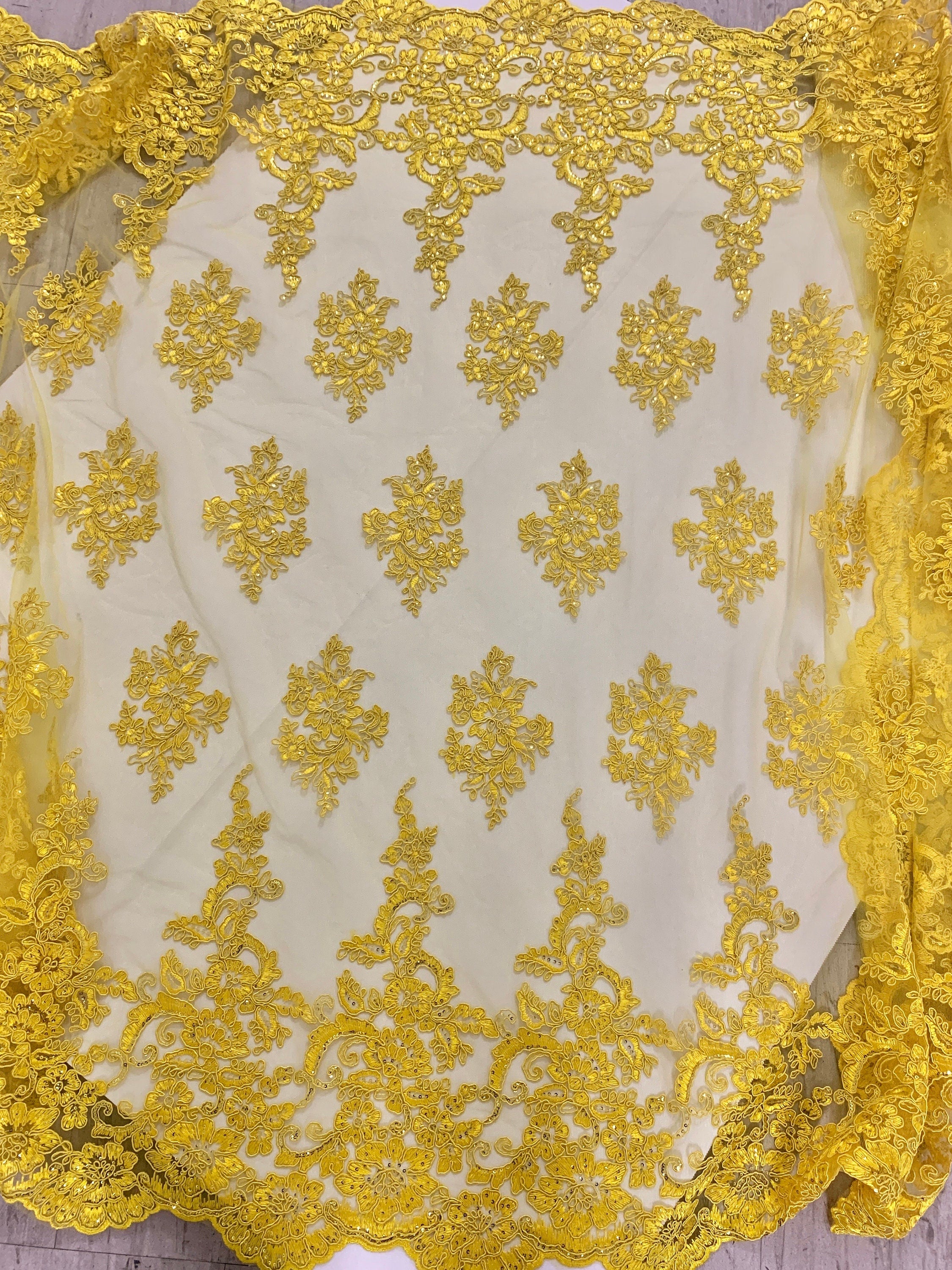 A 2 yard Yellow color Lace Design US50. Double scalloped sequence embroidered width 49/50 inches. condition New.