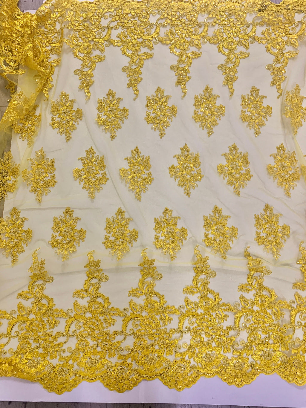 A 2 yard Yellow color Lace Design US50. Double scalloped sequence embroidered width 49/50 inches. condition New.