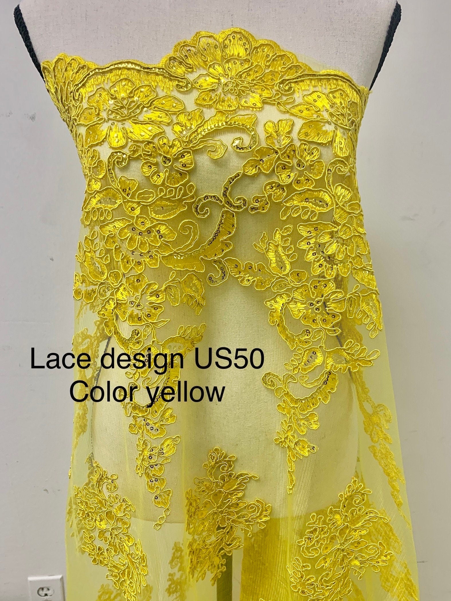 Yellow color Lace Design US50. Double scalloped sequence embroidered width 49/50 inches. condition New. sell by yard.