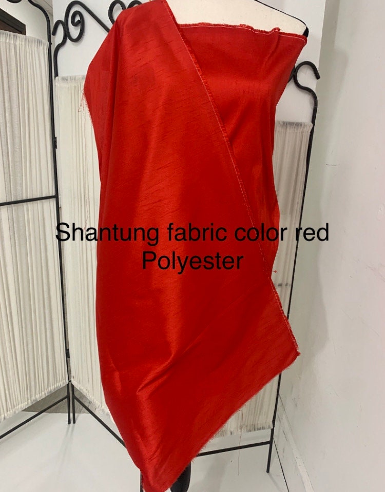 Red satin shantung fabric width 58" polyester, slubbed texture dull fininshed, dress, suiting and home decoration item. item 114