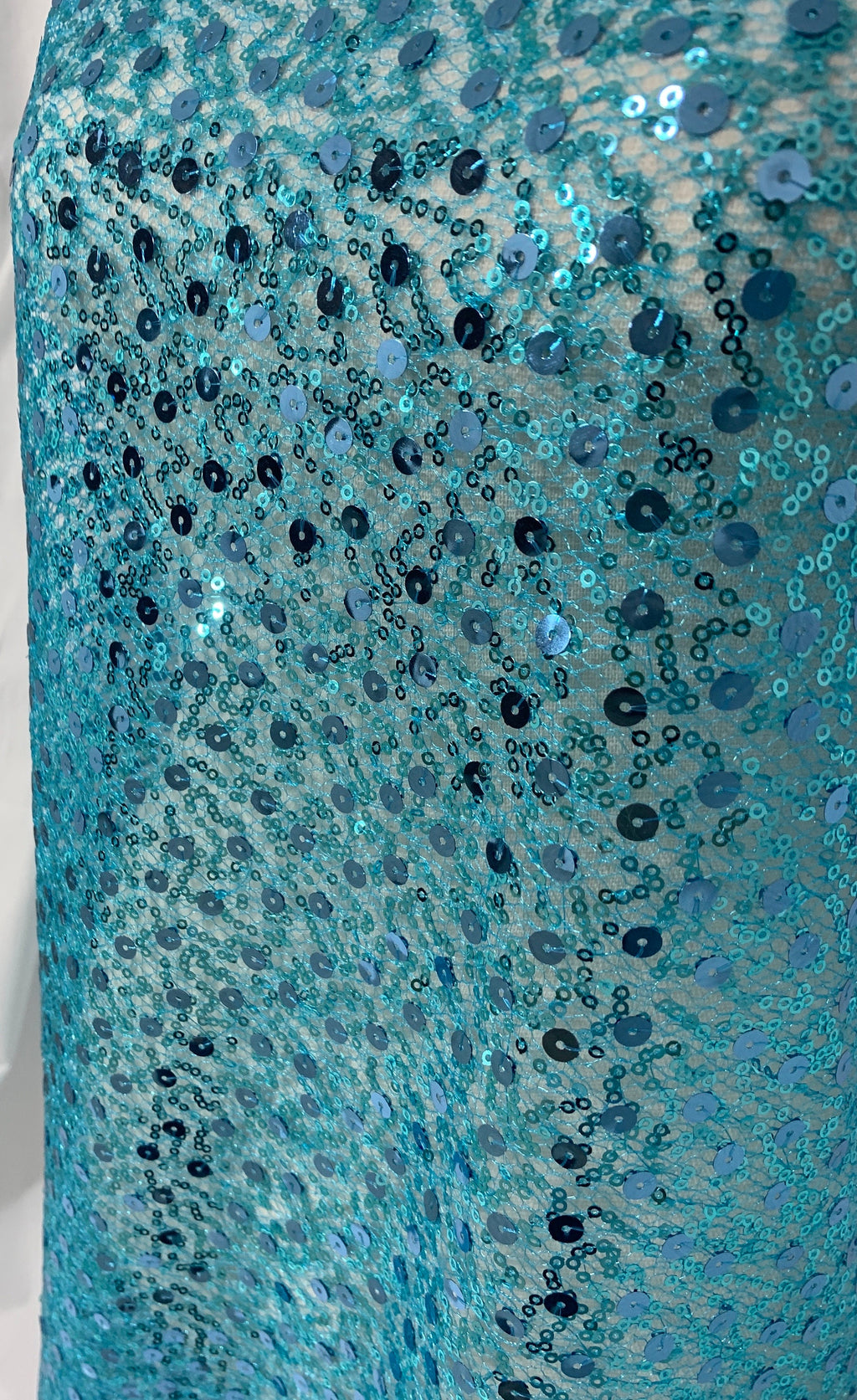 Turquoise Sequence mesh fabric, width 58", sell by yard, 3" plain mesh salvage on each side. great item for dress, costume, decoration.