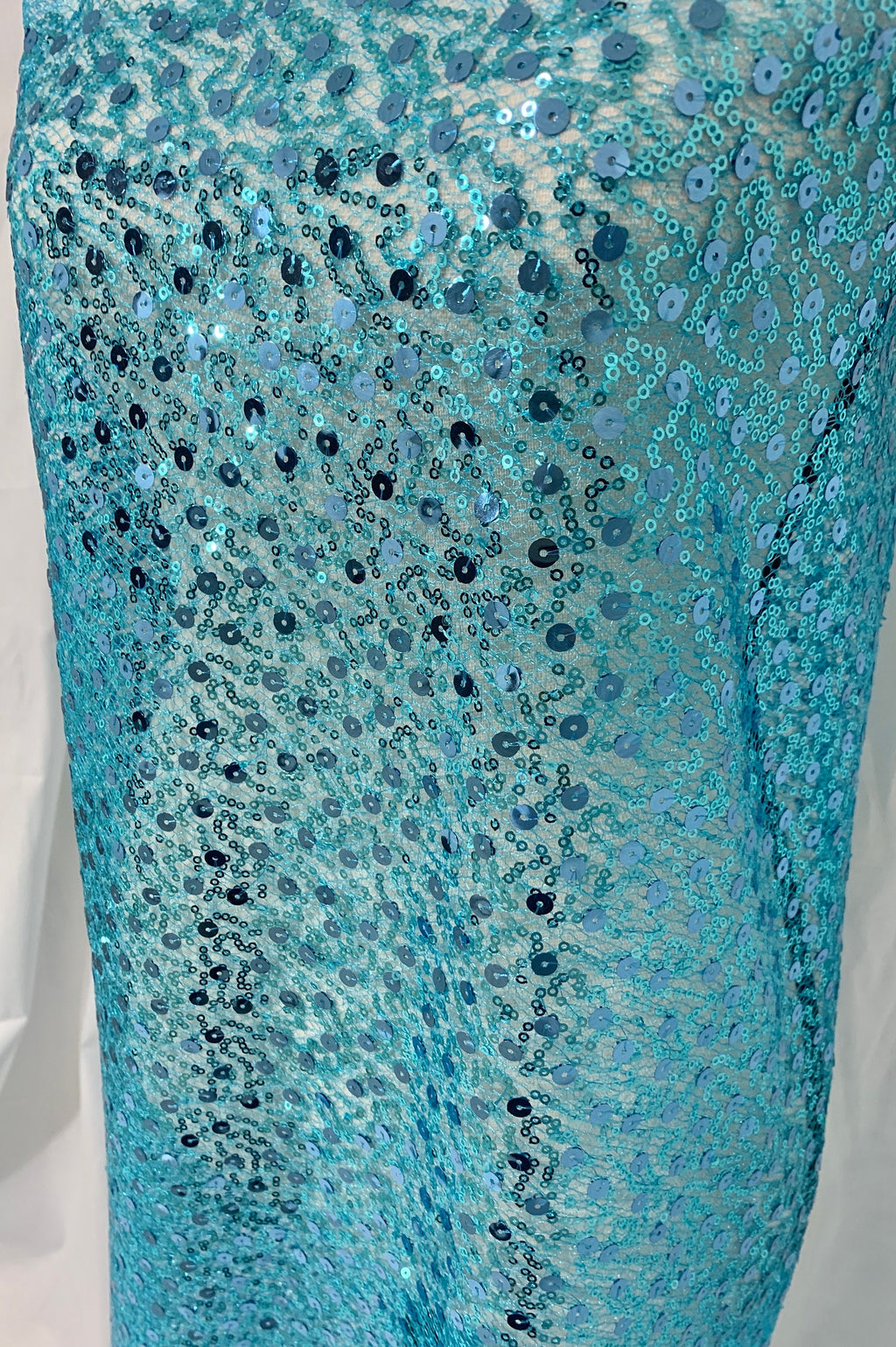 Turquoise Sequence mesh fabric, width 58", sell by yard, 3" plain mesh salvage on each side. great item for dress, costume, decoration.