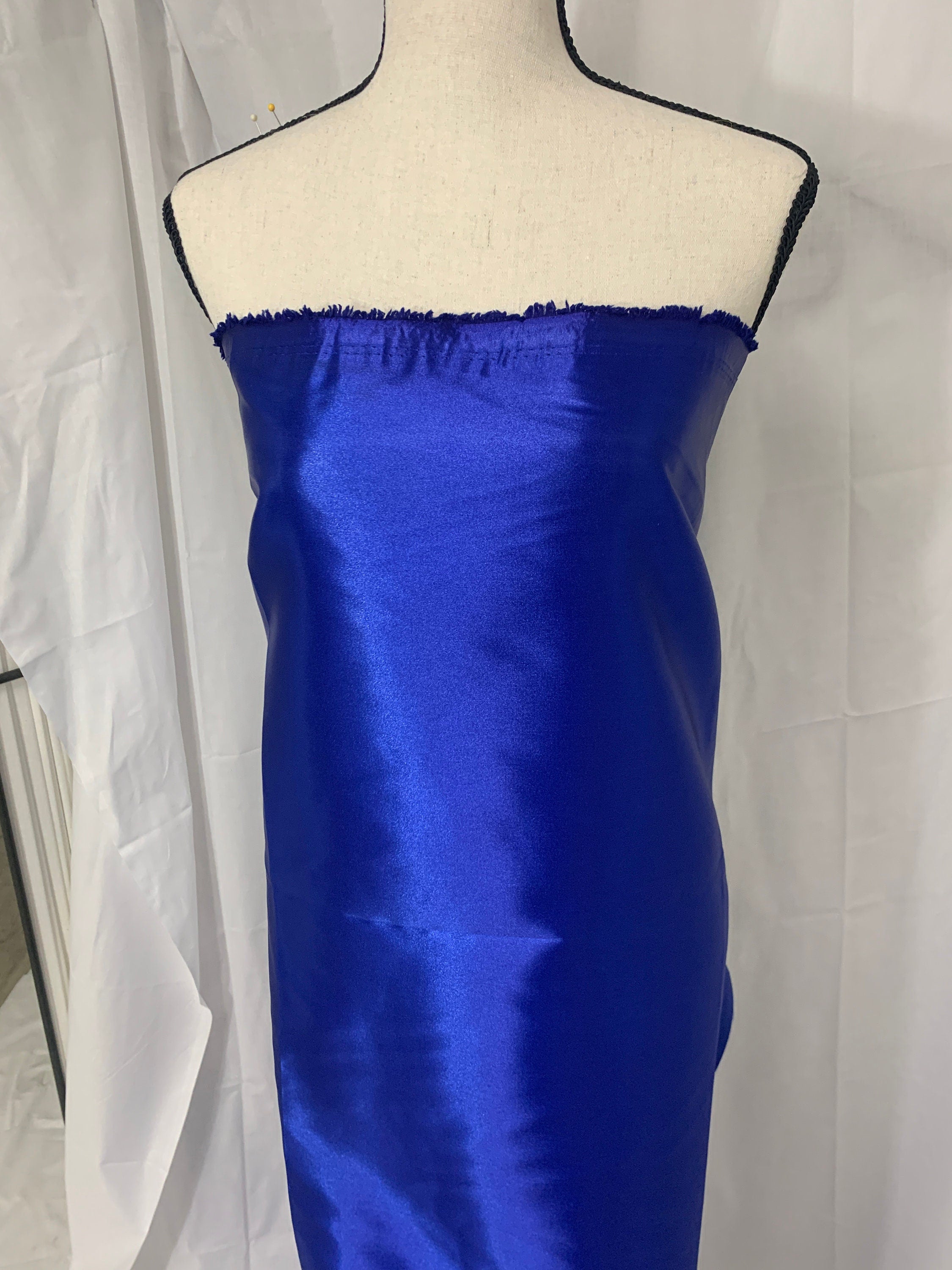 Royal blue satin width 58" polyester. great fabric for bridesmaid, table cover decoration and craft. free sample.
