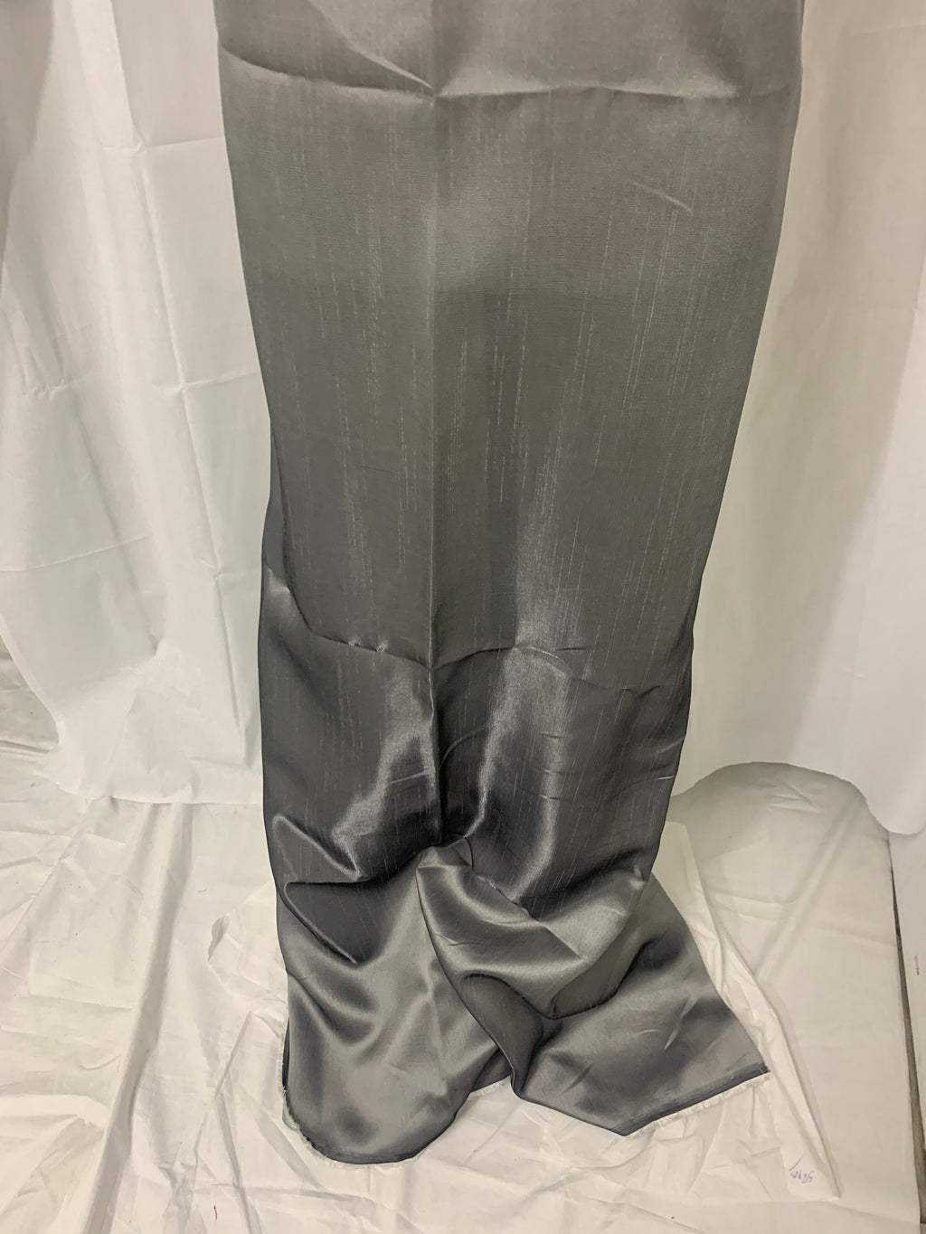 silver grey shimmer shantung fabric, width 58". Is a double sided fabric with slub, shimmery and dull sides dry clean fabric. Free sample.