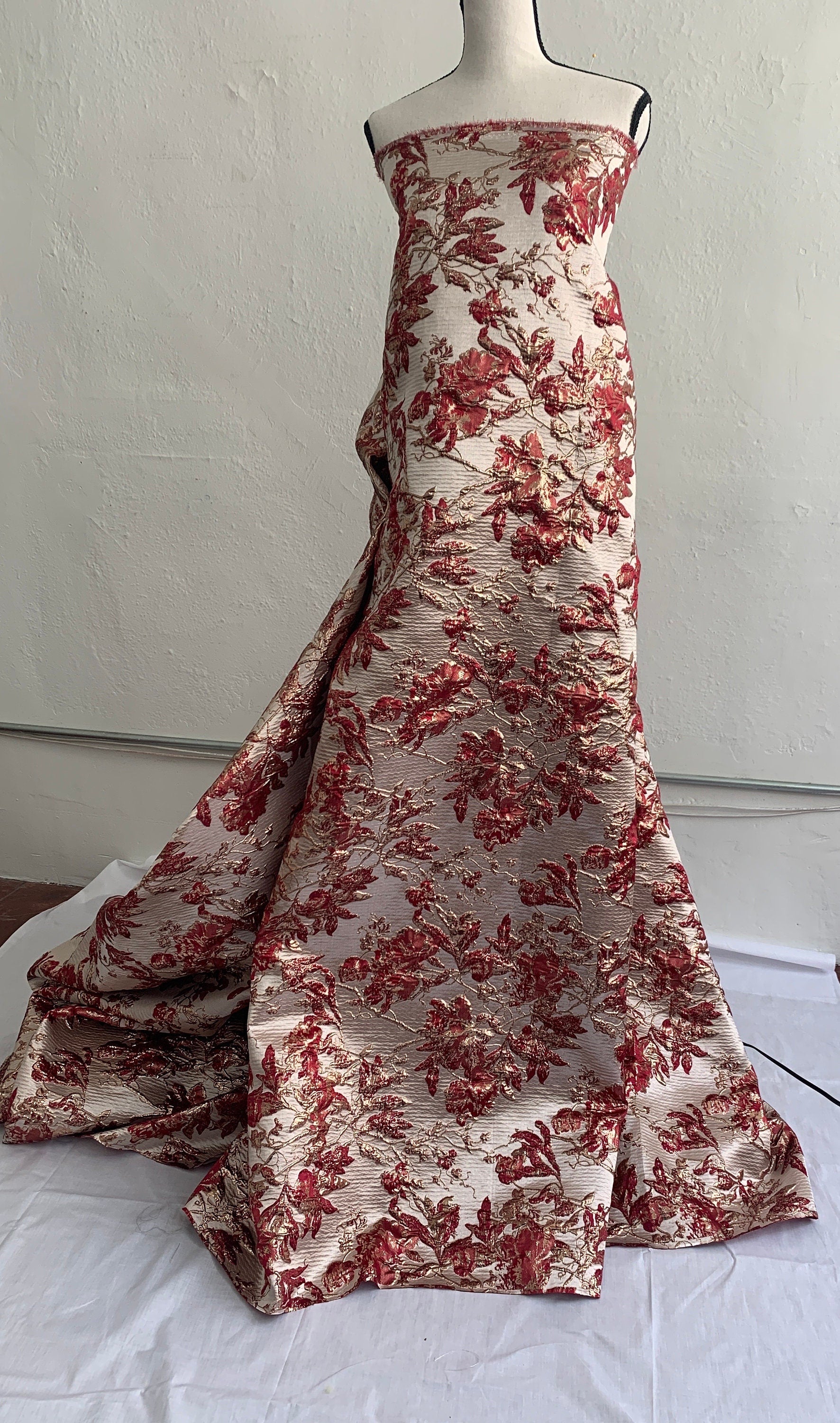 Brocade floral metallic fabric. color burgundy 56"