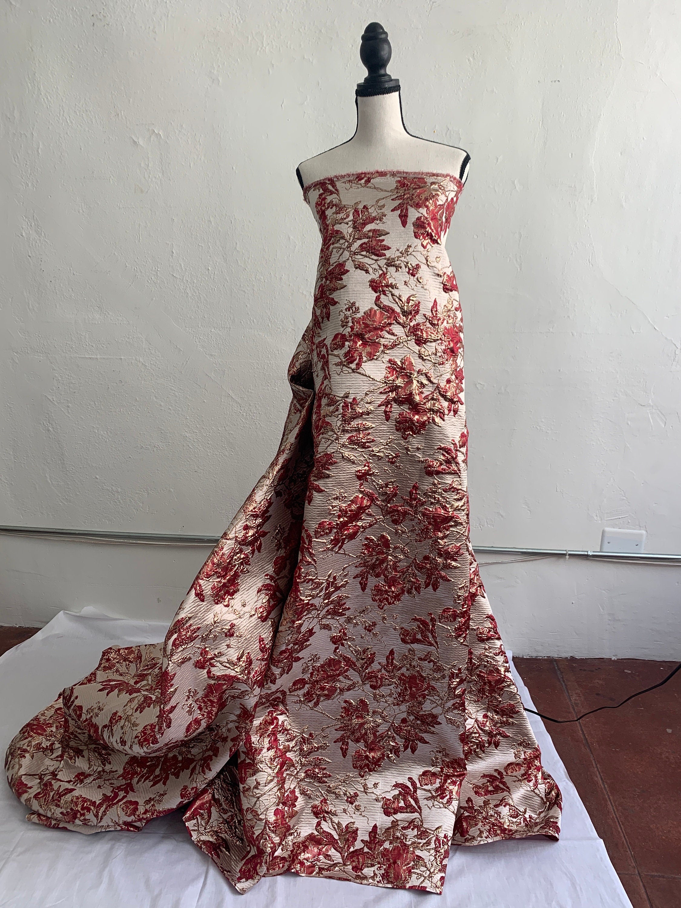 Brocade floral metallic fabric. color burgundy 56"