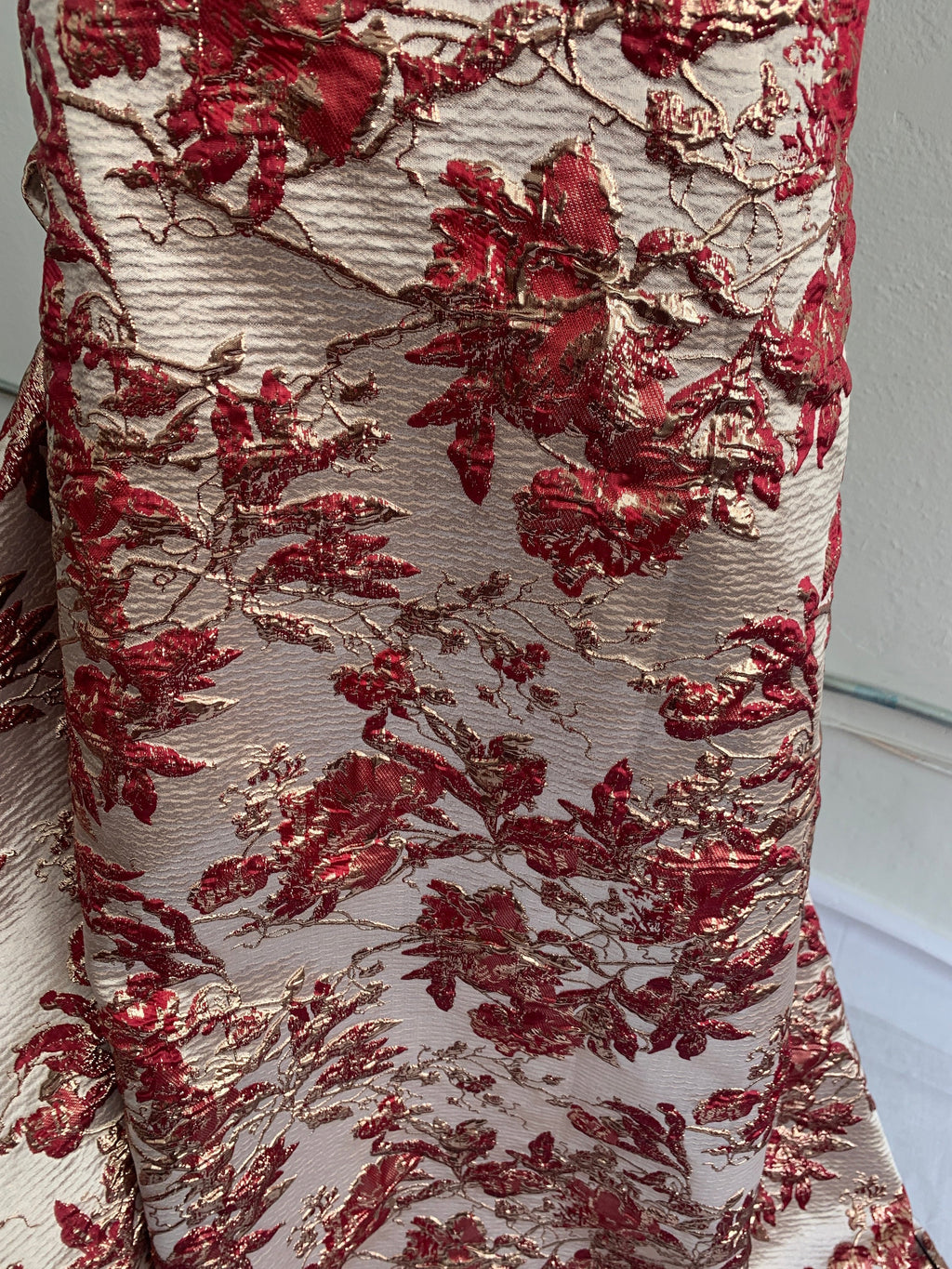 Brocade floral metallic fabric. color burgundy 56"