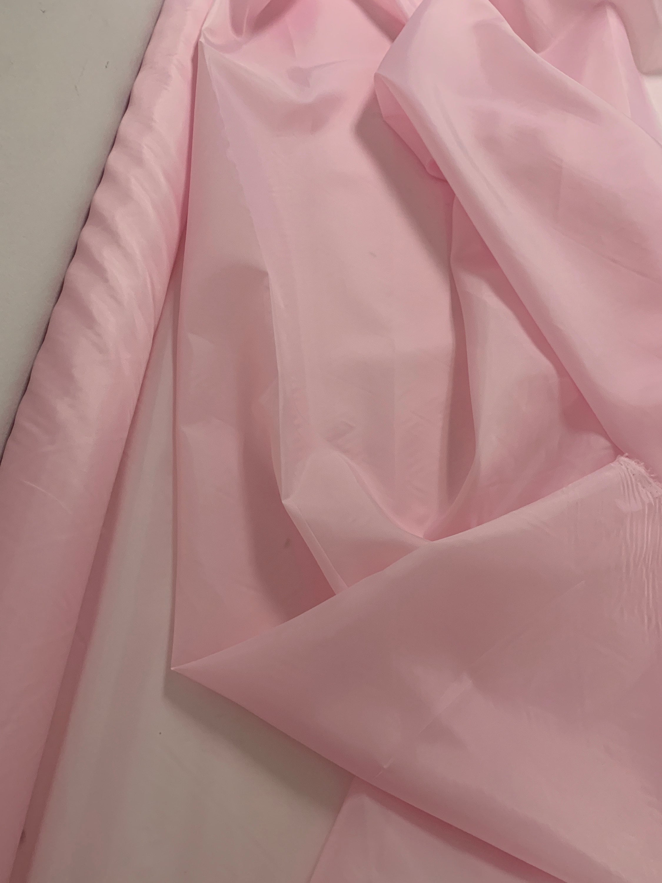 A 3 Yards Cut Pink Lining fabric, polyester, width 59". sell by 3 yards increment continues.
