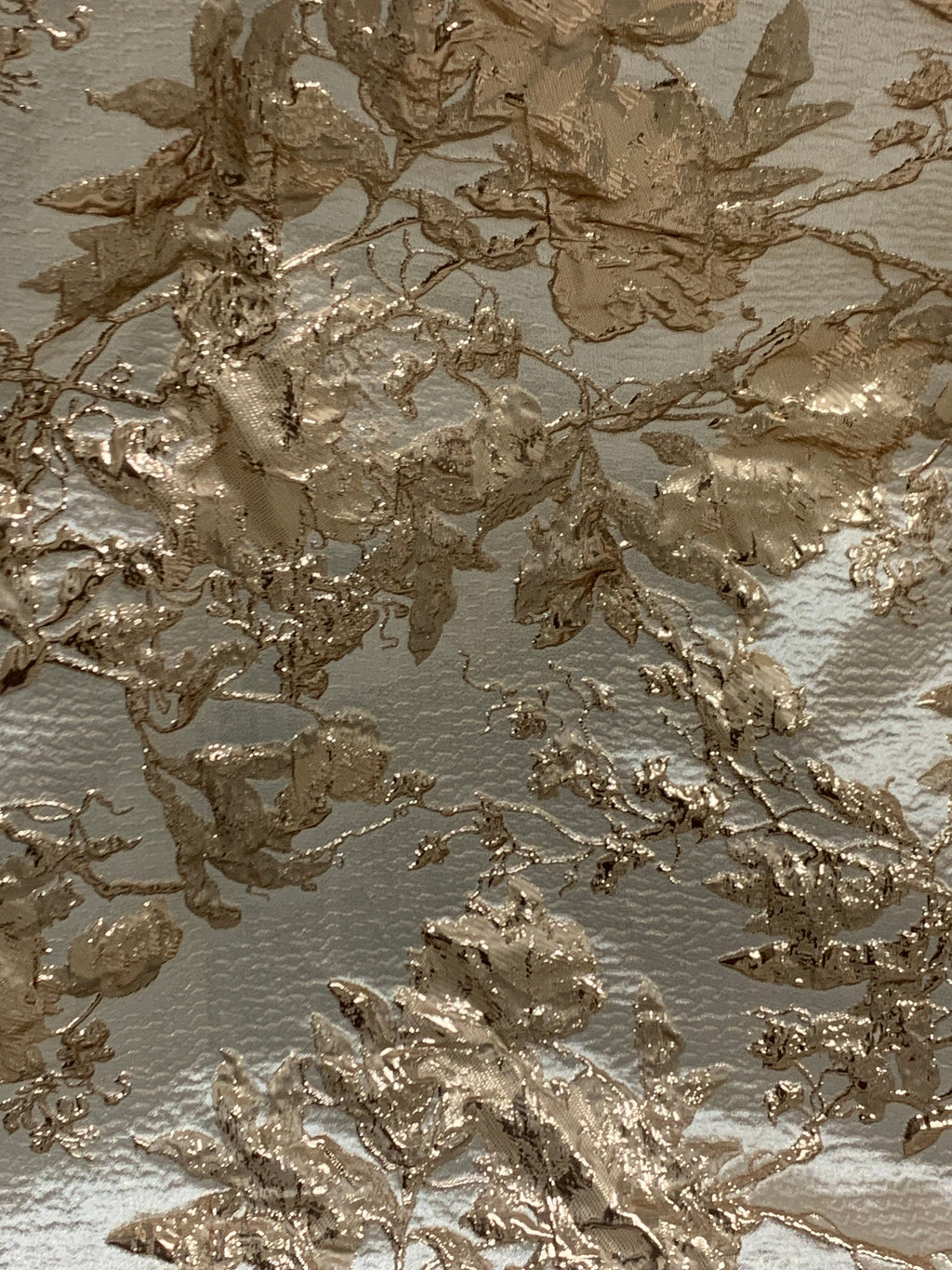 A 5 yards floral metallic Brocade fabric. color is Gold Rose width 56".