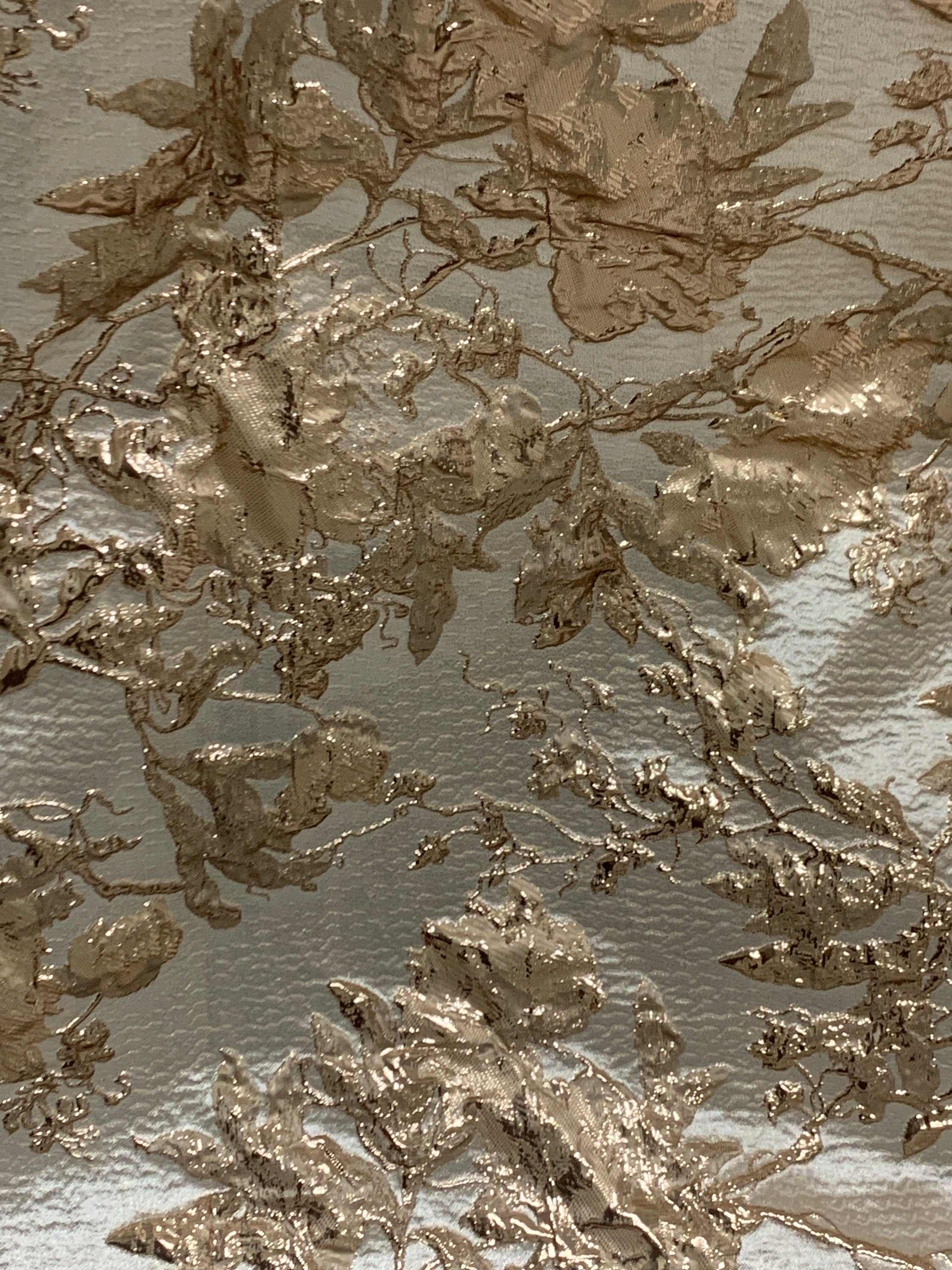 A 5 yards floral metallic Brocade fabric. color is Gold Rose width 56".