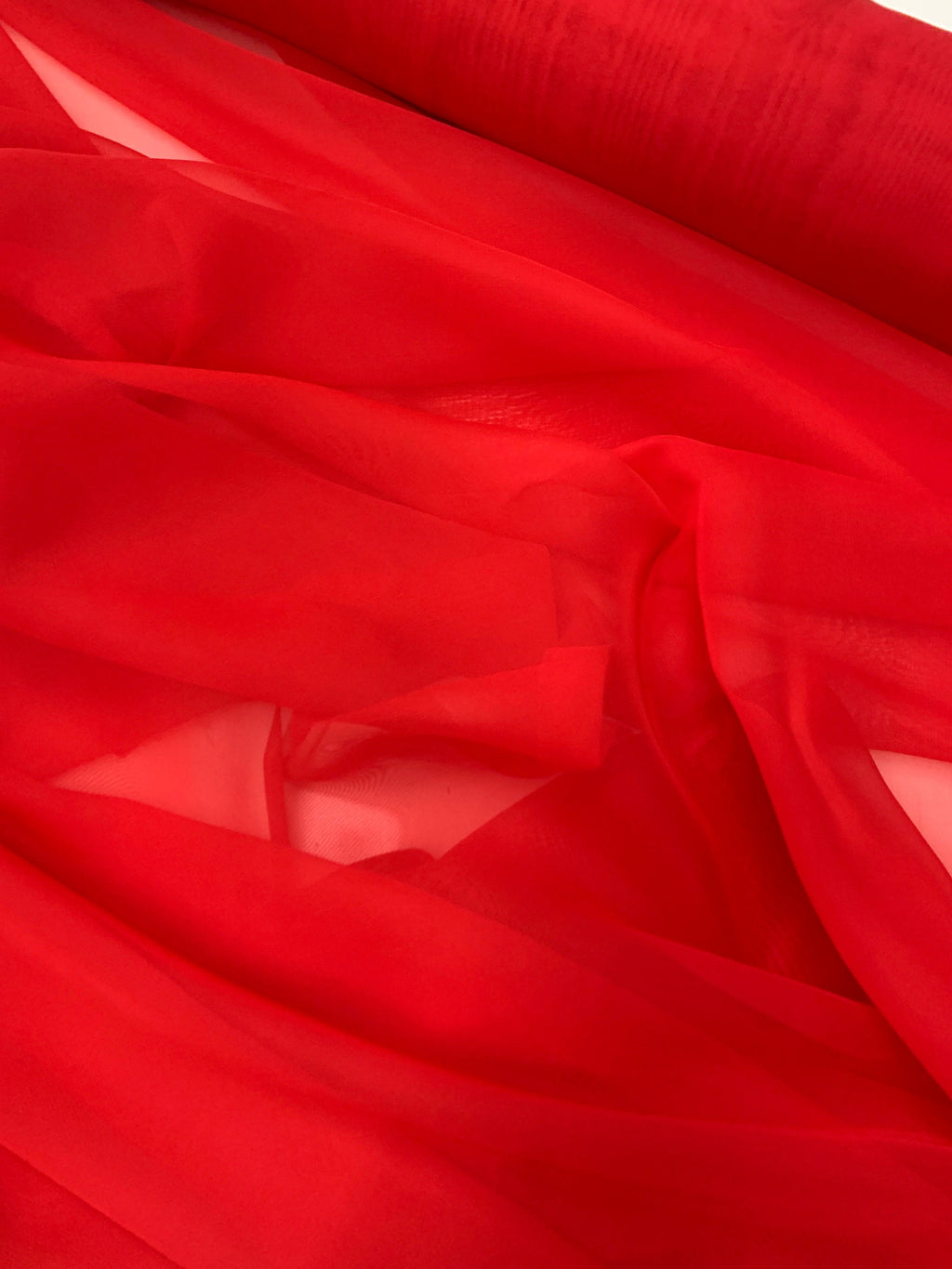 A 2 yards Red chiffon Fabric width 58/60 inches , sell by 2 yards cut continuous.
