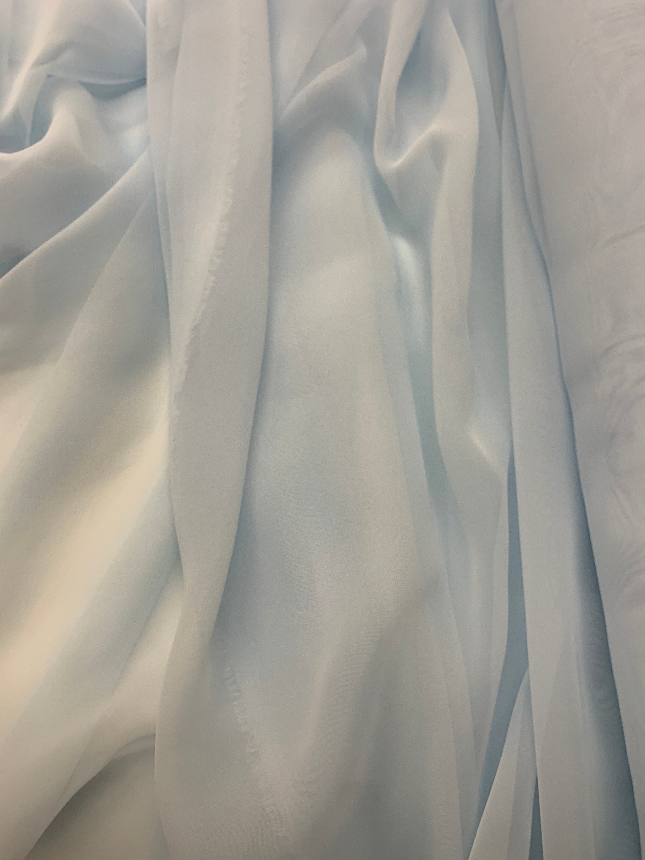 Lt. blue chiffon Fabric width 58/60 inches wide, sell and yards. Free sample Available for domestic address
