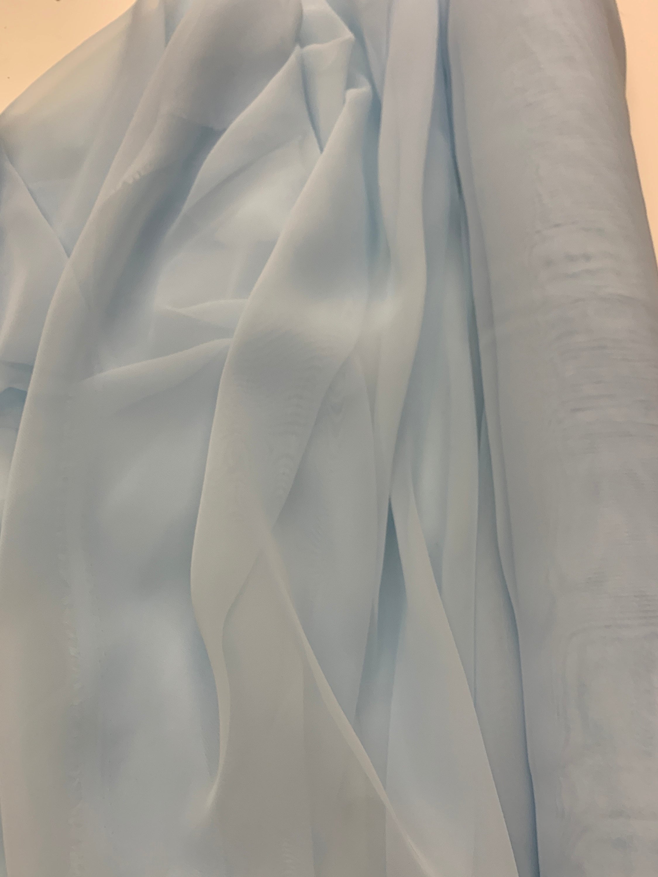 Lt. blue chiffon Fabric width 58/60 inches wide, sell and yards. Free sample Available for domestic address