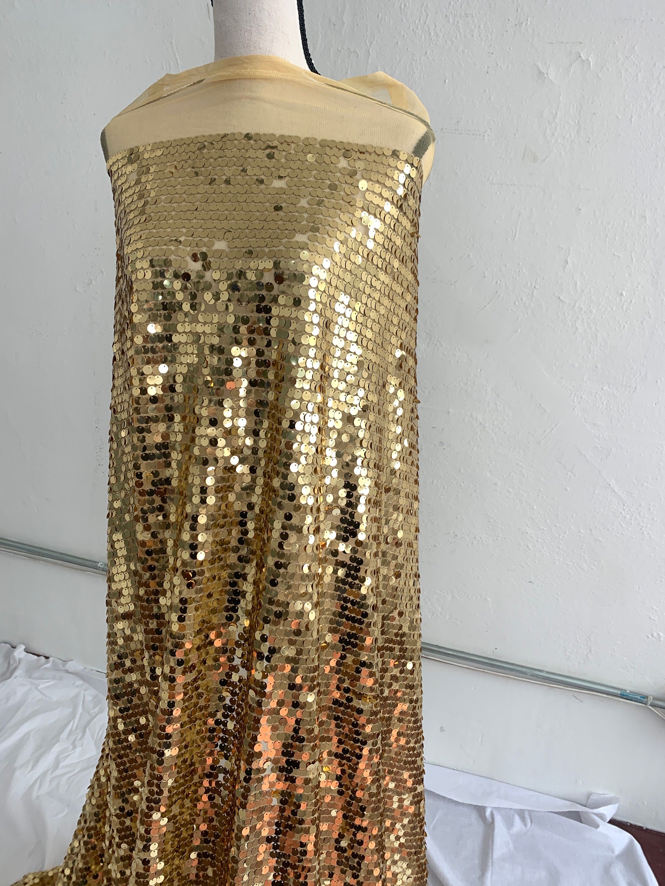 A piece 5 yards cut sequence gold color