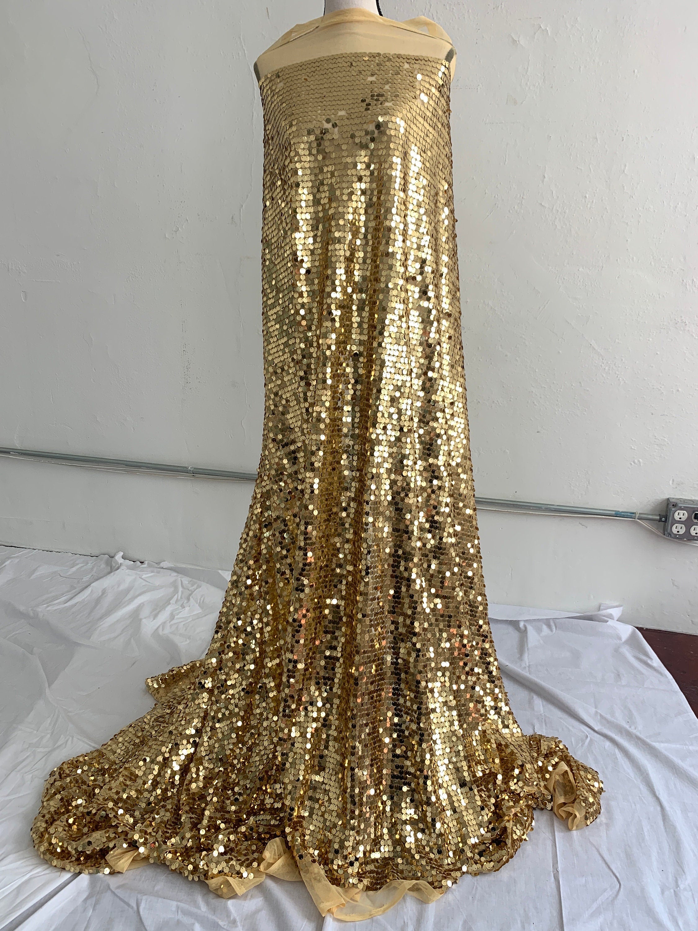 A piece 5 yards cut sequence gold color