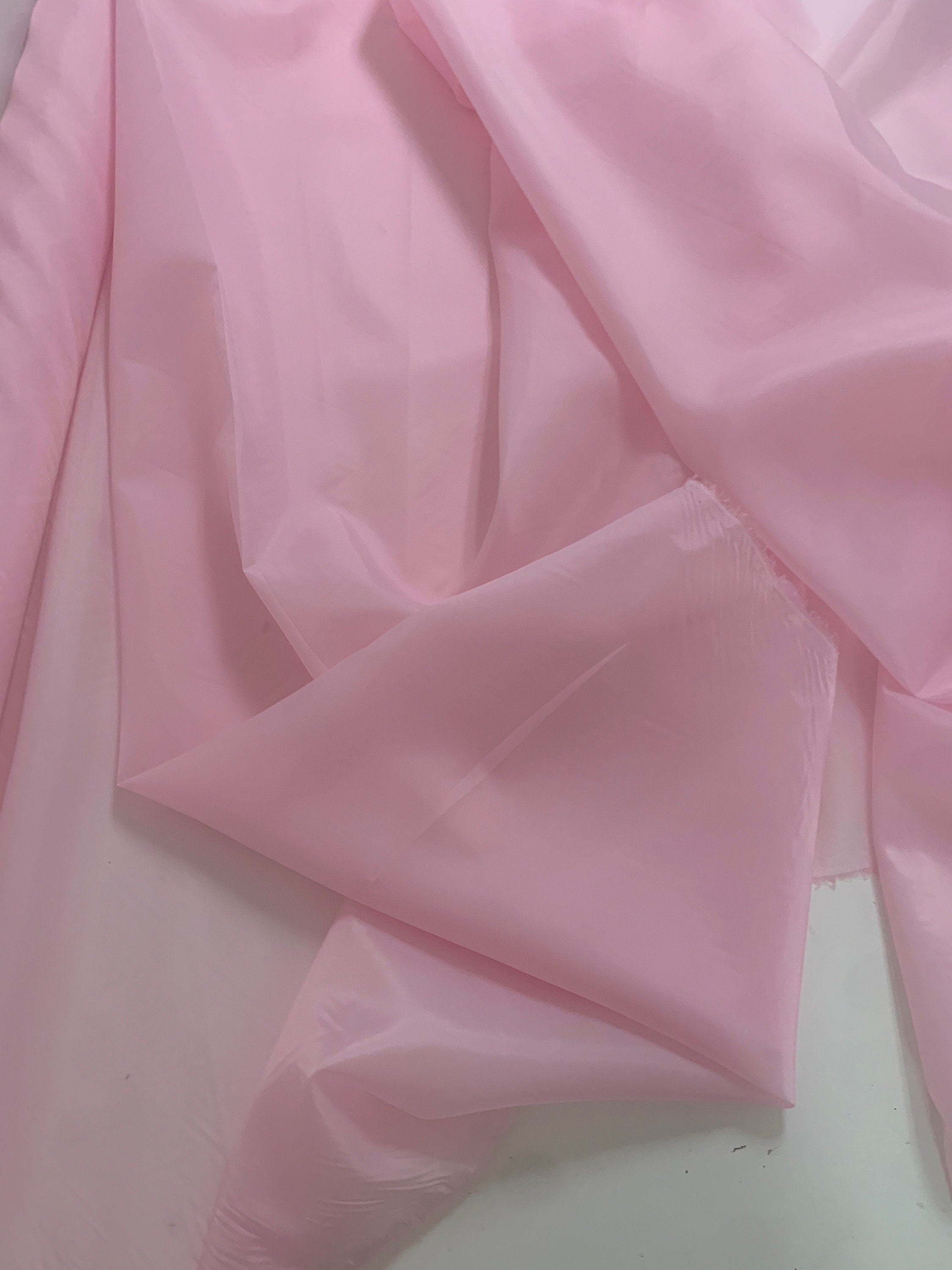 A 3 Yards Cut Pink Lining fabric, polyester, width 59". sell by 3 yards increment continues.