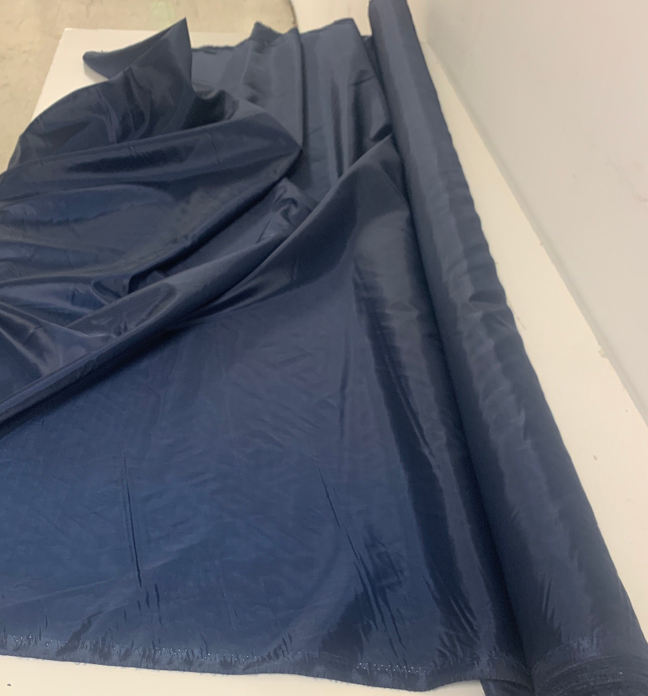 A 2 yards cut Lining fabric color navy, polyester, width 59", sell by 2 yards continuous.