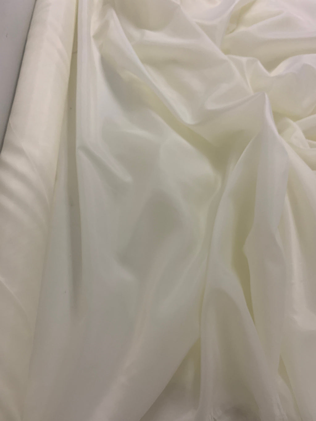 A 2 yards cut Ivory poly Lining fabric, 100% polyester, width 59". sells by 2 yard increment continuous