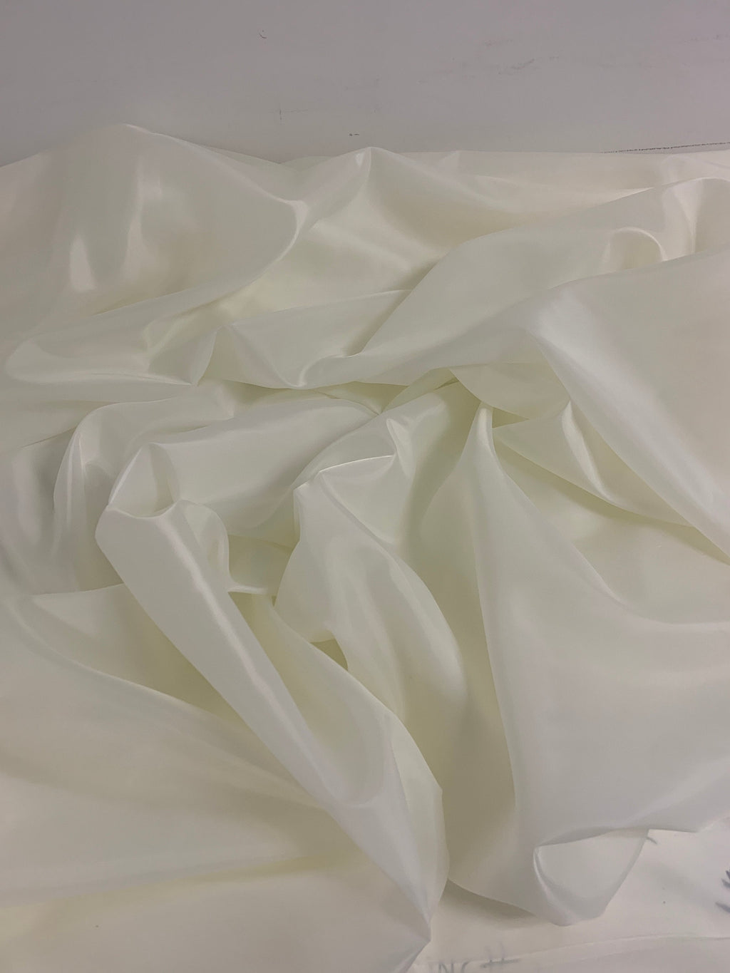 A 2 yards cut Ivory poly Lining fabric, 100% polyester, width 59". sells by 2 yard increment continuous