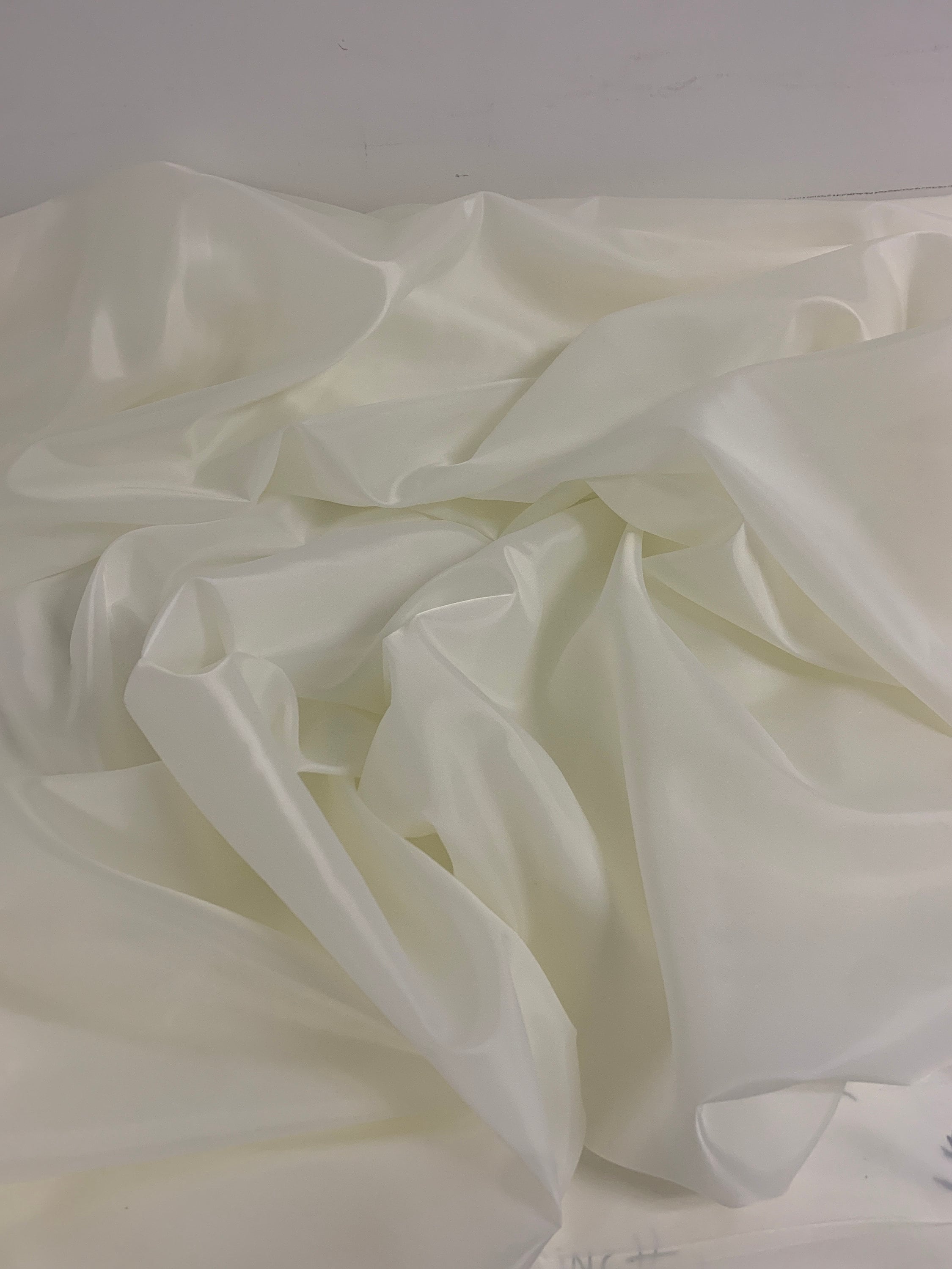 A 2 yards cut Ivory poly Lining fabric, 100% polyester, width 59". sells by 2 yard increment continuous