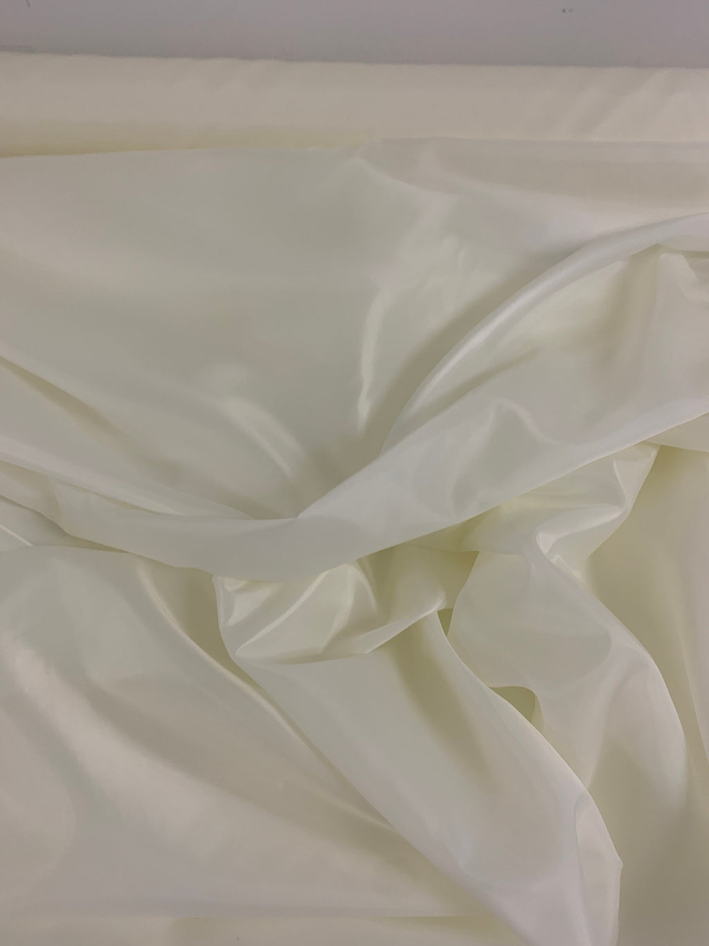 A 2 yards cut Ivory poly Lining fabric, 100% polyester, width 59". sells by 2 yard increment continuous
