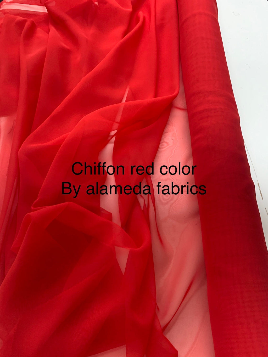 A 2 yards Red chiffon Fabric width 58/60 inches , sell by 2 yards cut continuous.