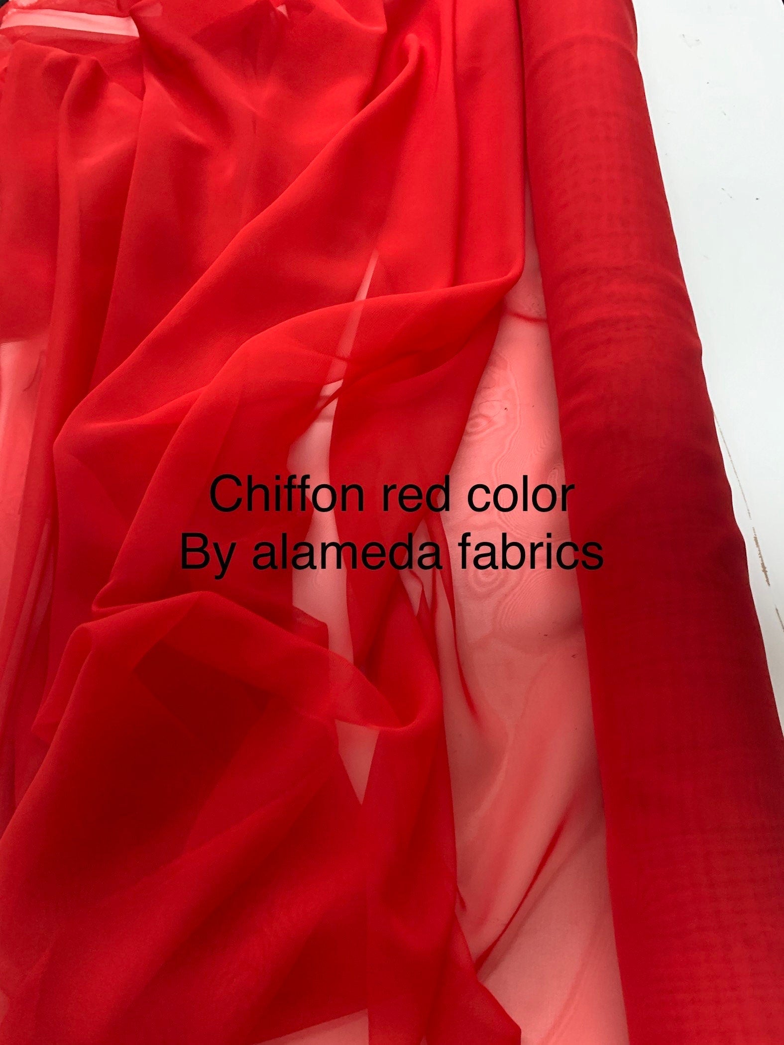 A 2 yards Red chiffon Fabric width 58/60 inches , sell by 2 yards cut continuous.