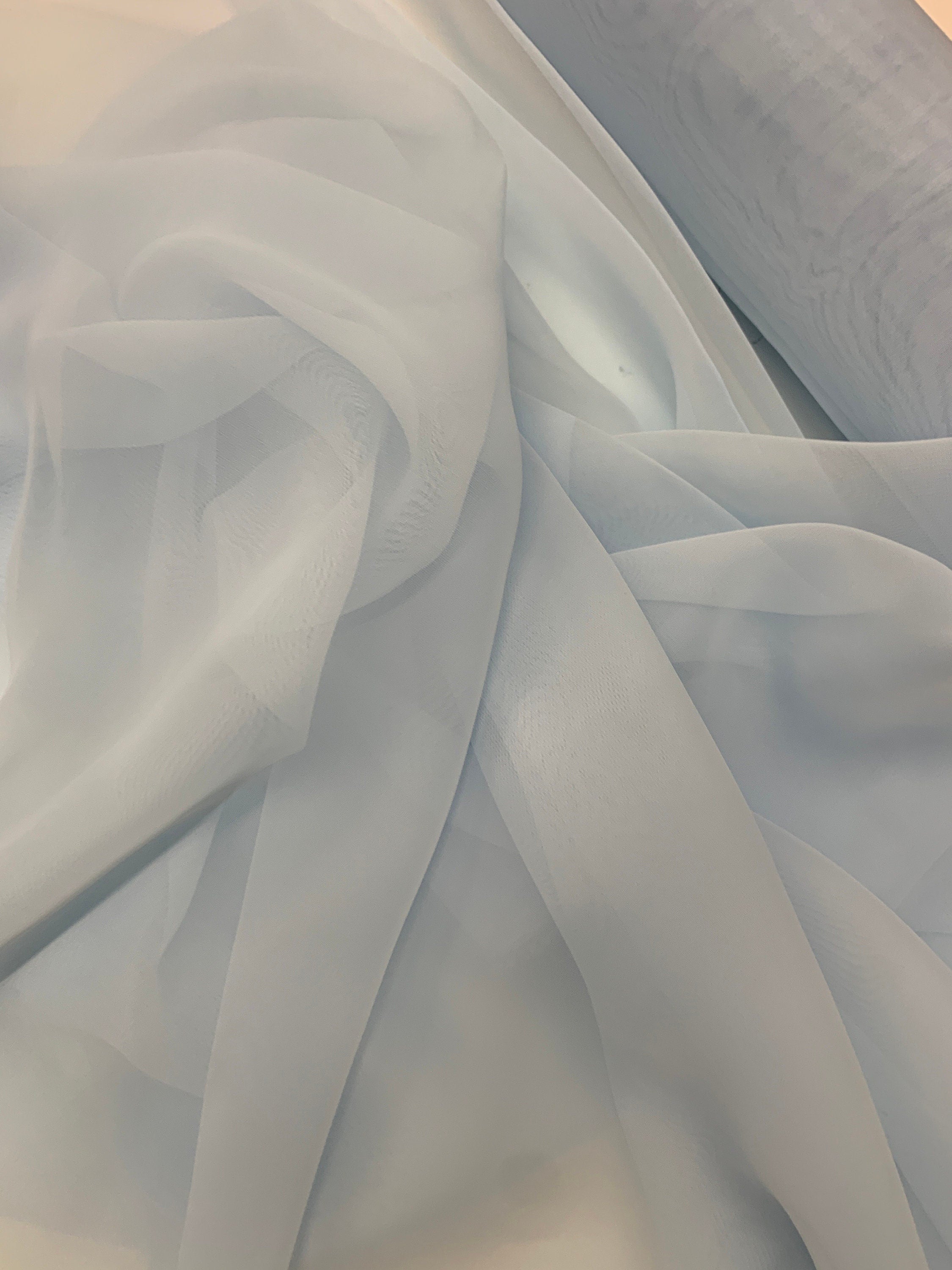 Lt. blue chiffon Fabric width 58/60 inches wide, sell and yards. Free sample Available for domestic address