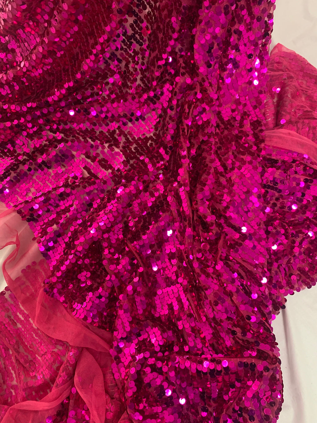 5 yards cut Fucshia sequence fabric.