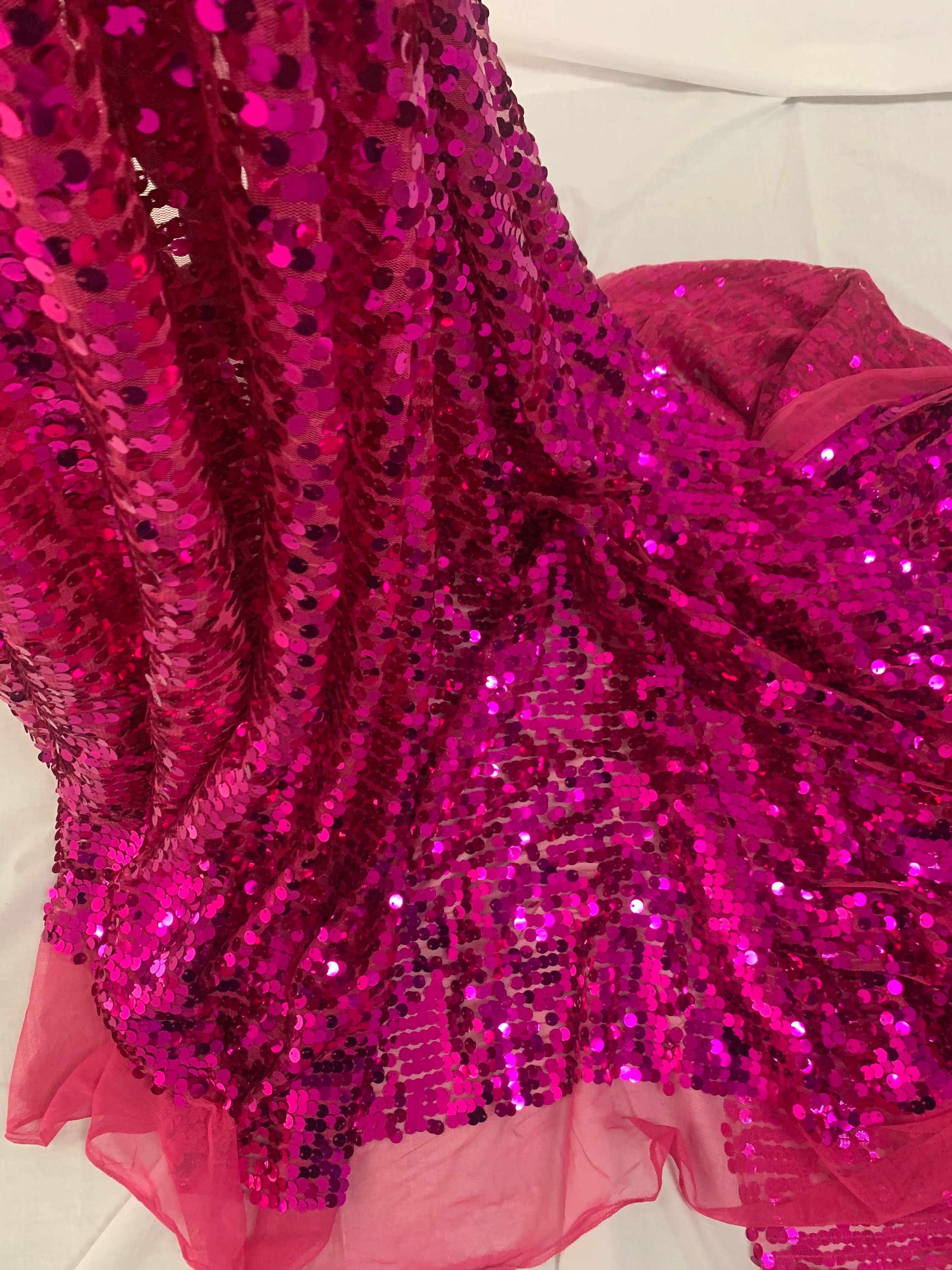 5 yards cut Fucshia sequence fabric.