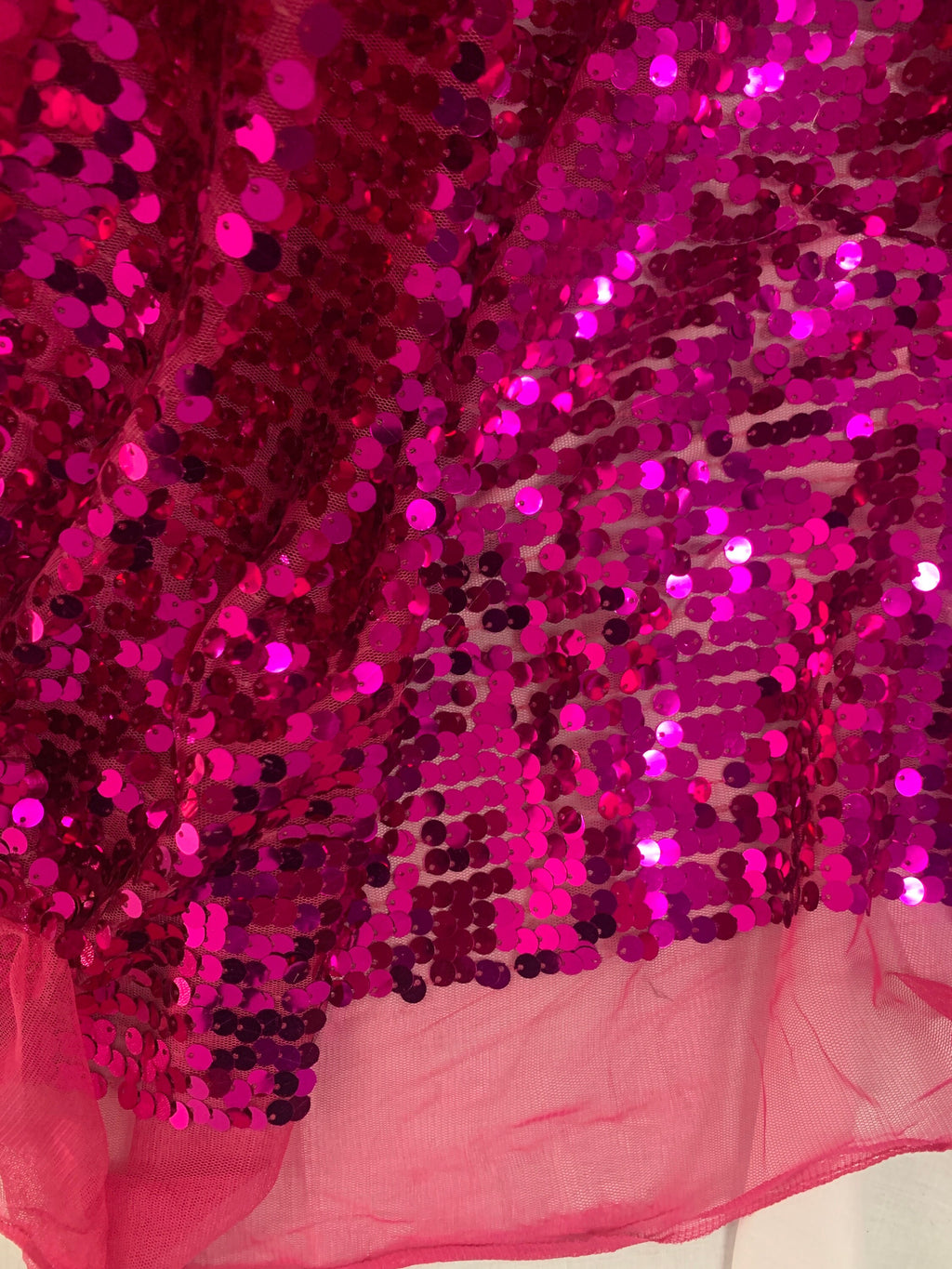 5 yards cut Fucshia sequence fabric.