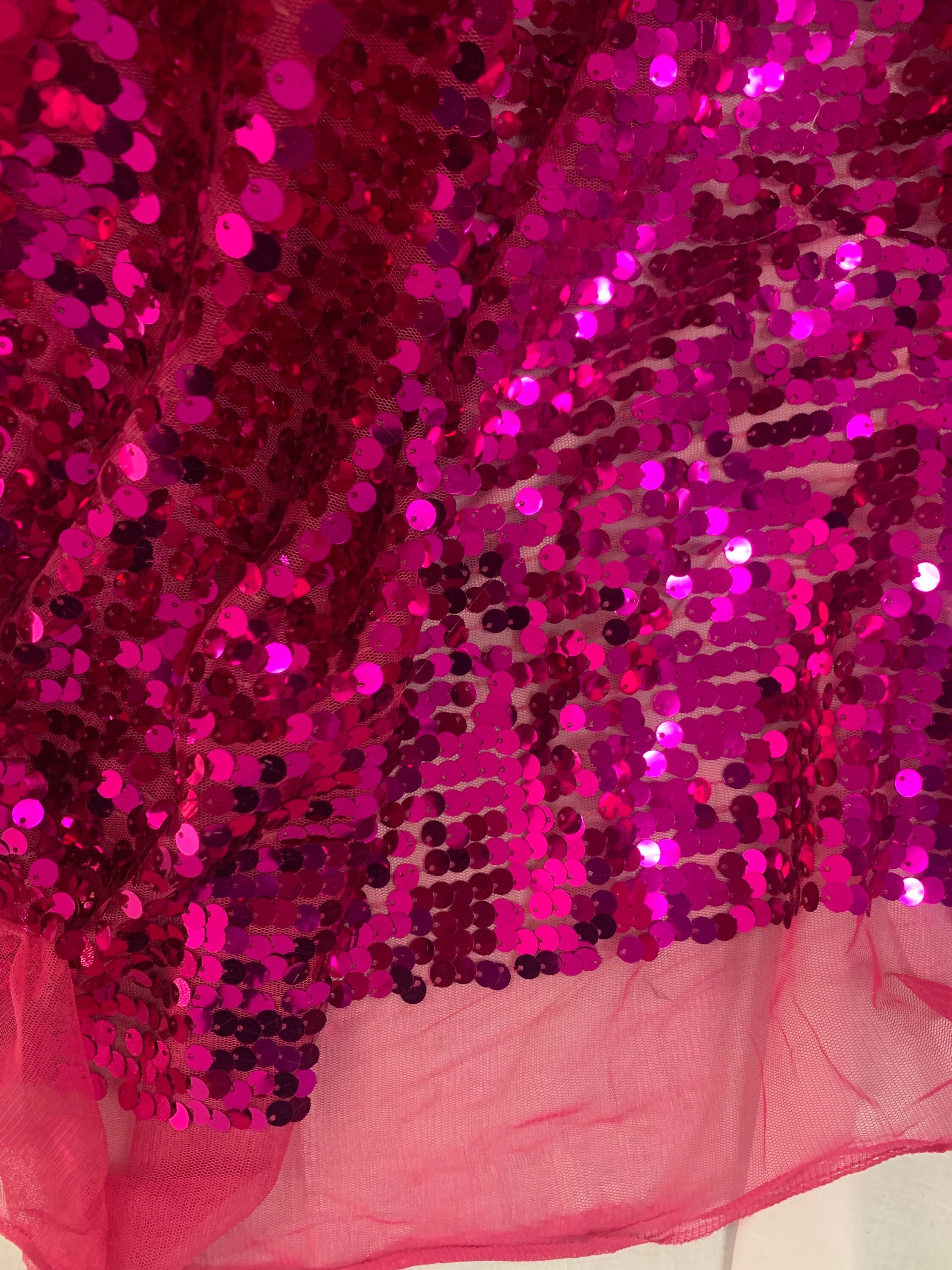 5 yards cut Fucshia sequence fabric.