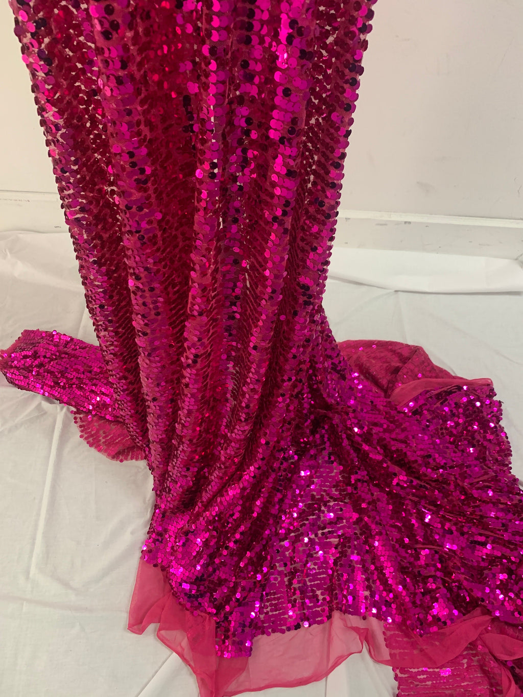 5 yards cut Fucshia sequence fabric.