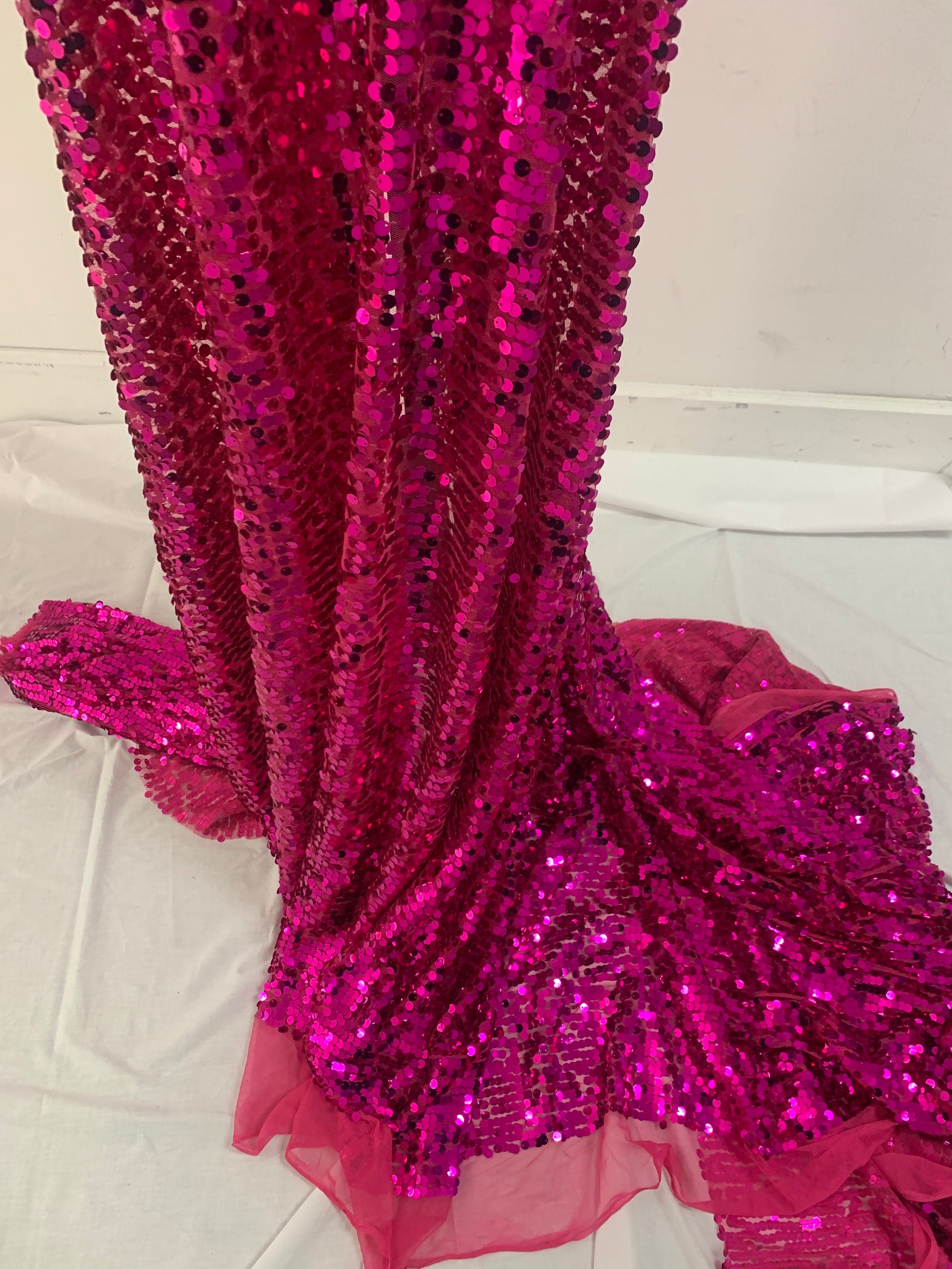5 yards cut Fucshia sequence fabric.