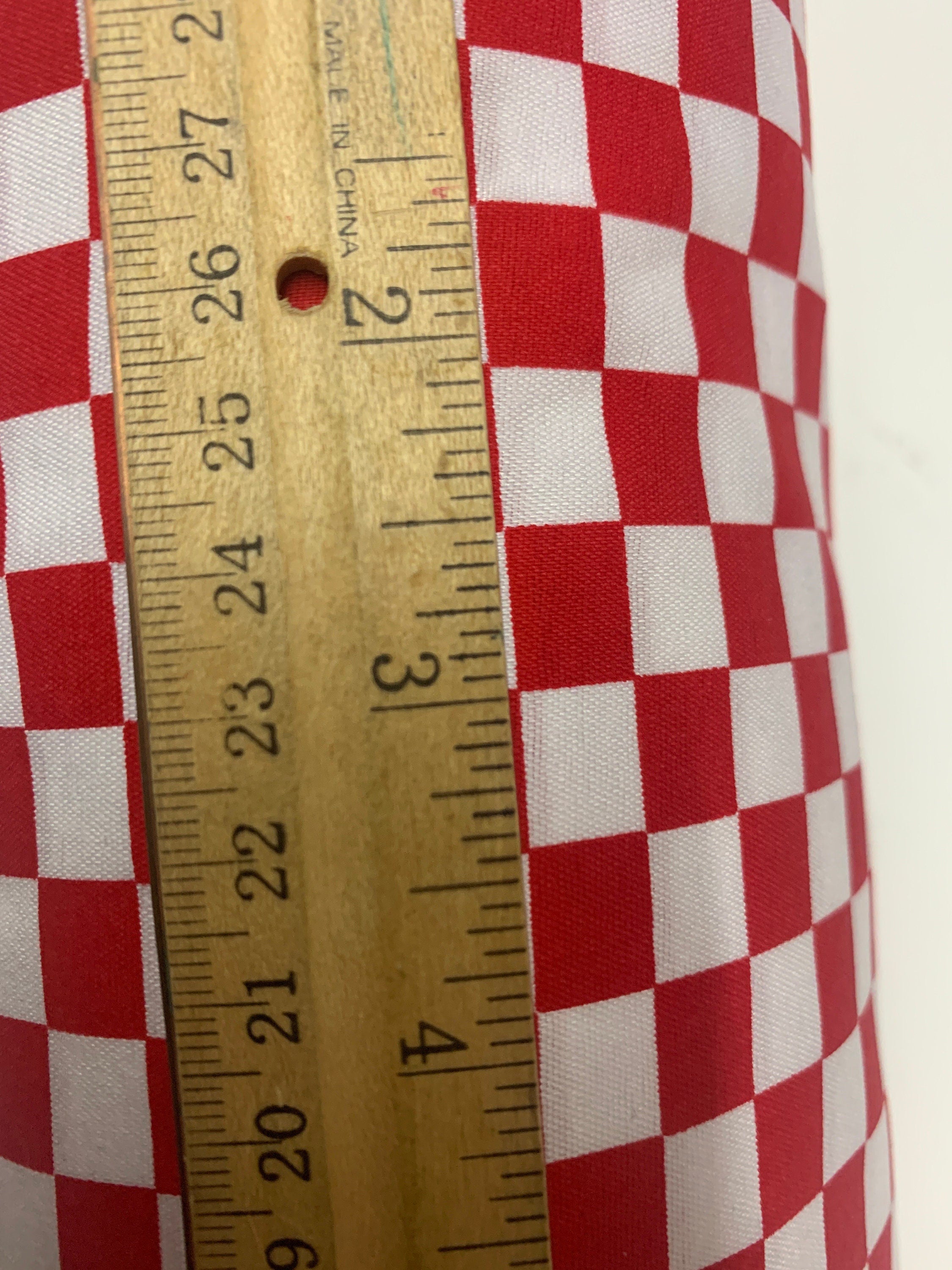 Small checker flag fabric, Broadcloth polyester fabric, shirt weight width 58 inches,1/2” inch square box. great uniform,table cloth, craft.