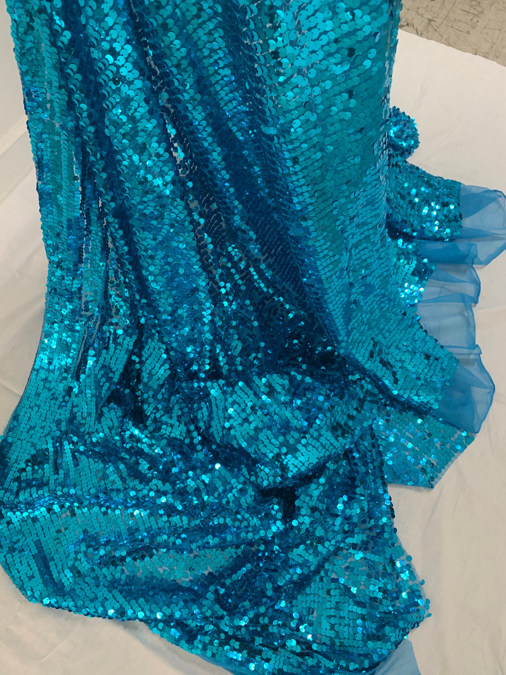 3 yards cut Turquoise Sequins fabric.