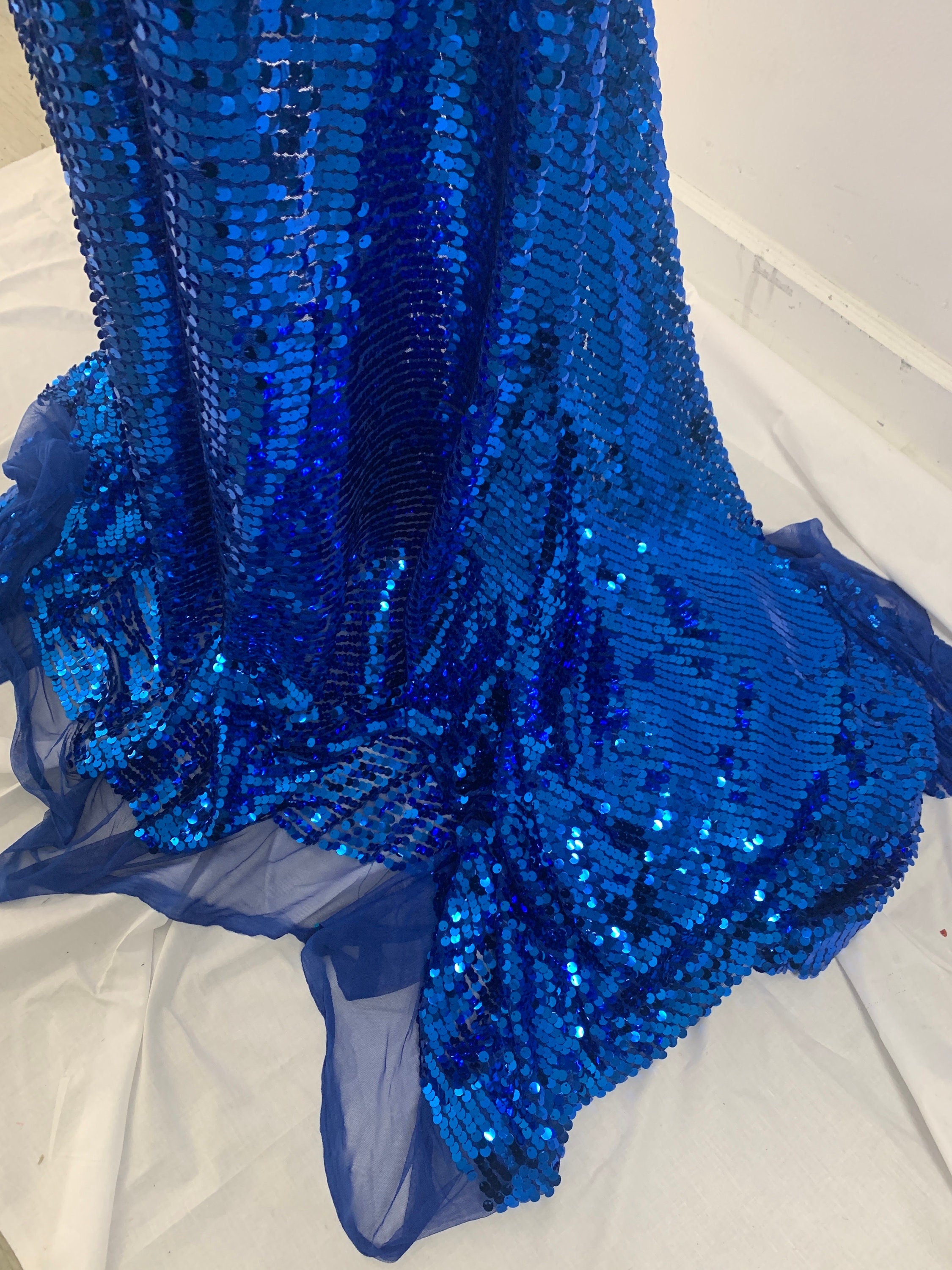 3 yards cut Royal Sequins fabric.